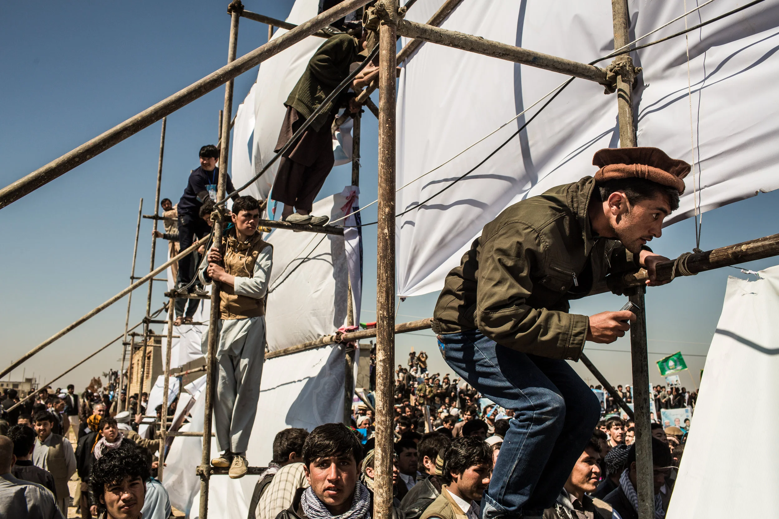 3/27/2014 Mazar e Sharif, Afghanistan Supporters of Dr. Abdullah Abdullah attempted to get a glimpse of the presidential candidate at a campaign rally held in his honor in Mazar e Sharif, which numbered int he tens of thousands.