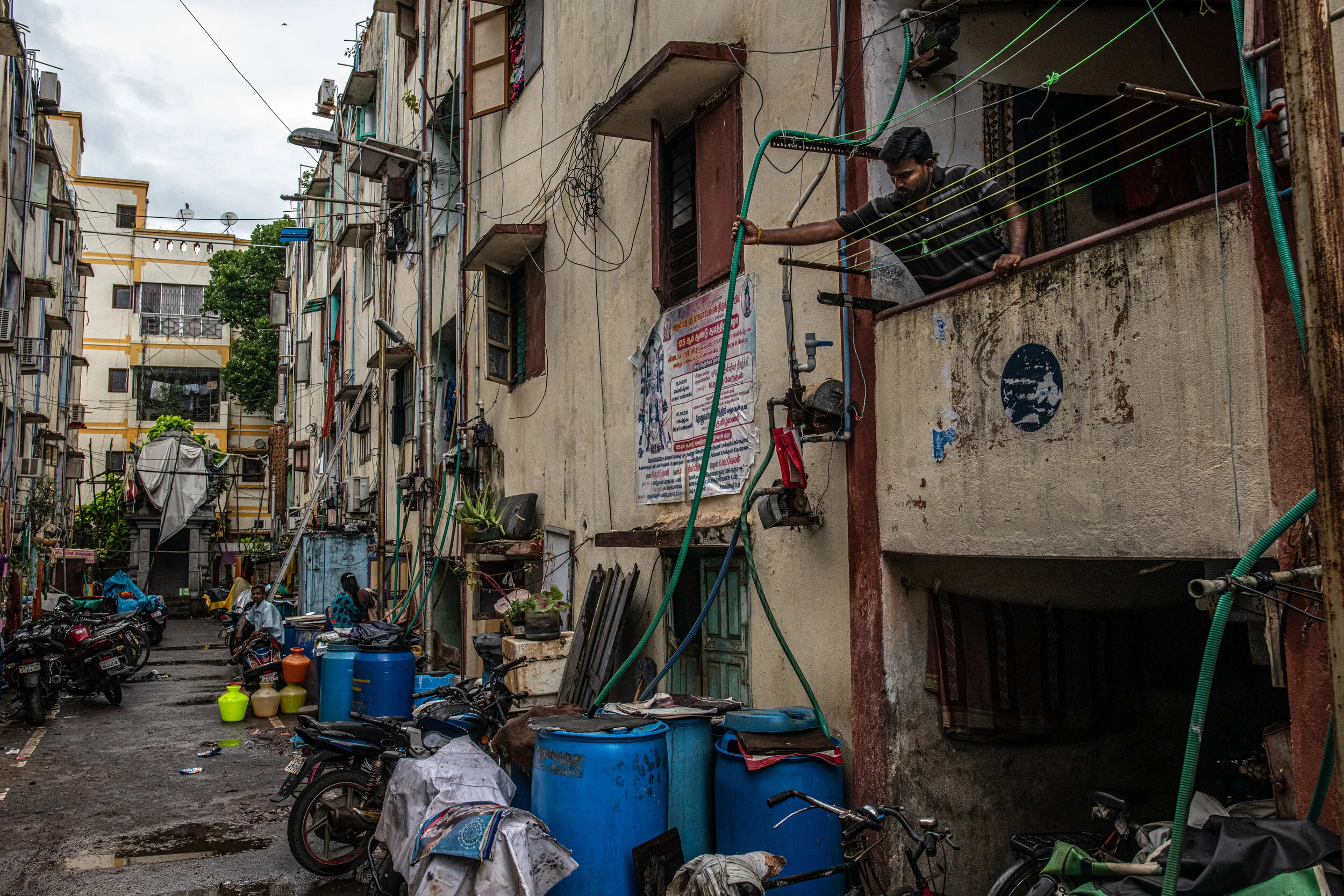  10/31/2019 Chennai, India  A resident of Chennai checked the pump and hose that is connected to the water barrels that feed water into his house, prior to a tanker truck delivery in late October. Earlier this year, Chennai was in the news around the
