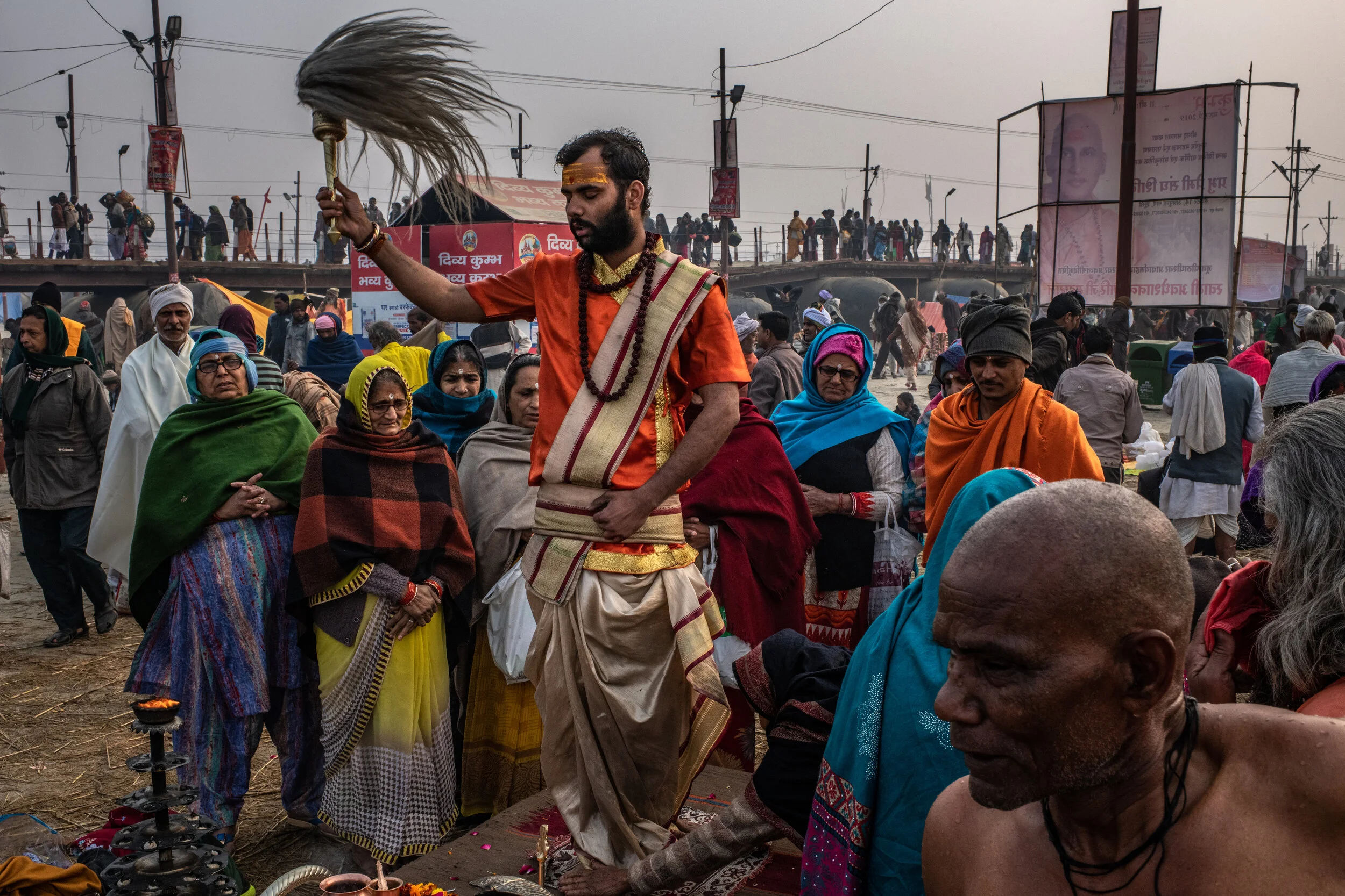 2/3/2019 Prayagraj, Uttar Pradesh, India  A Hindu priest performed the morning Ganga Aarti, along the eastern banks of the Ganges river as followers listened nearby, at Prayagraj, India, during this year's Ardh Kumbh Mela. 