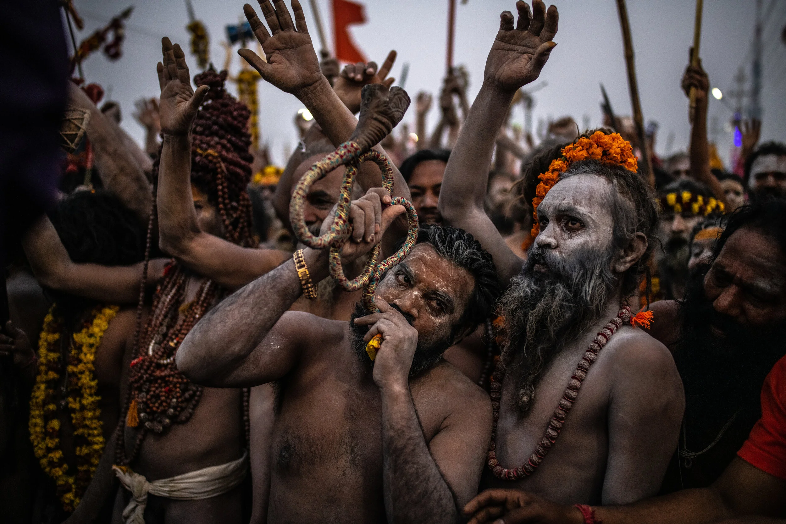  2/4/2019 Prayagraj, Uttar Pradesh, India  Naga Sadhu's, the Hindu faith's ascetic monks, many naked, armed with swords, tridents and other weapons, draped in garlands of marigolds and covered in ash, chanted as they marched to the banks of the Sanga