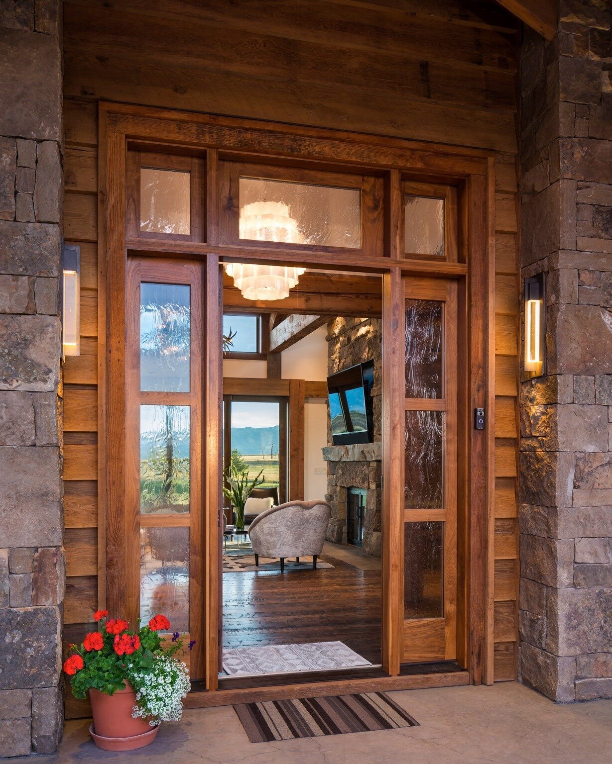 Opening doors to a world of awe-inspiring beauty and refined living as you're greeted by this stunning front door. Beyond its inviting threshold lies a seamless connection to nature's splendor. A glimpse through to the back door reveals a private gol