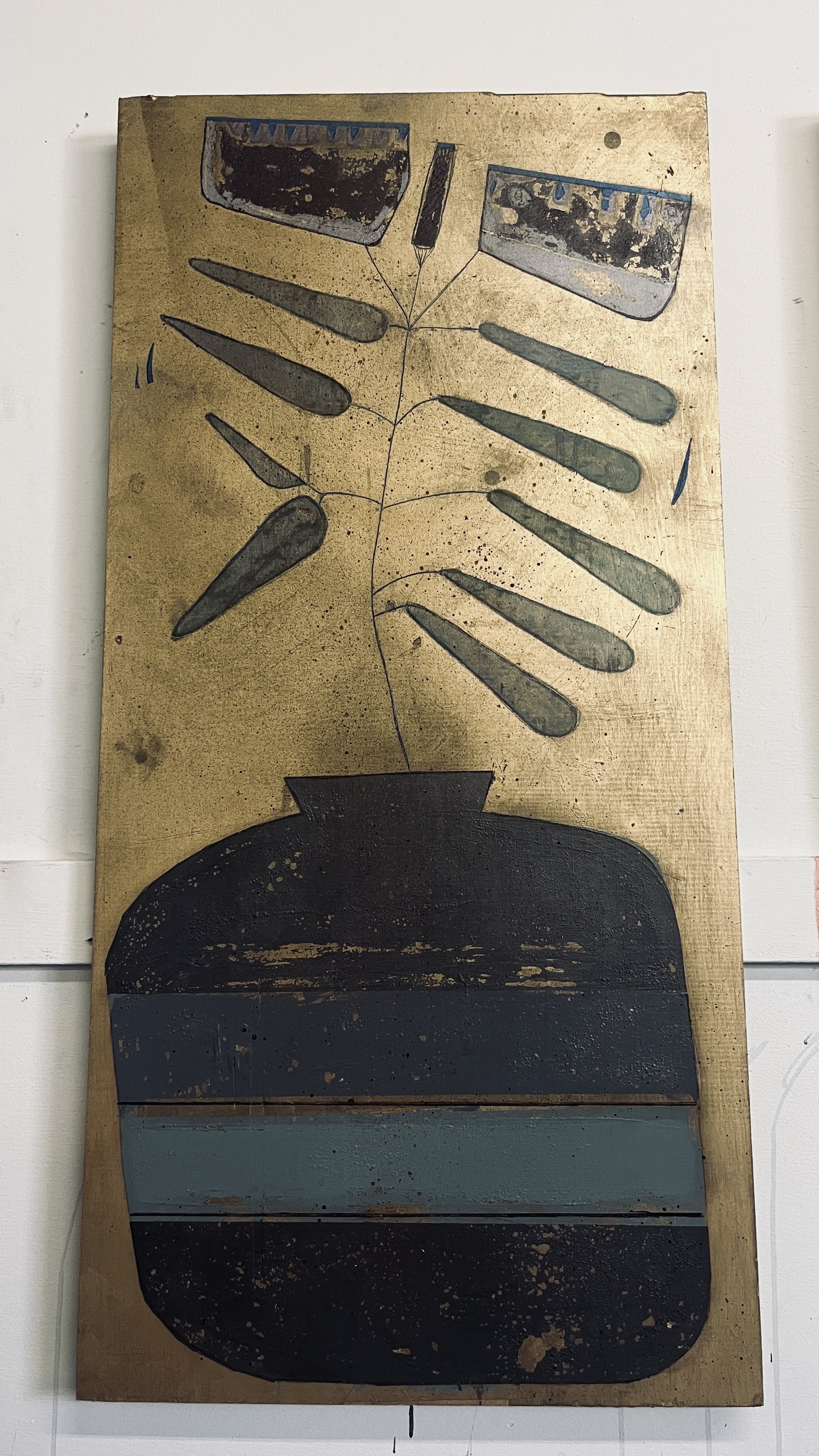 Painting of a potted plant with broad leaves on a yellow background hospitality decor gold patinated decoration residential art work.