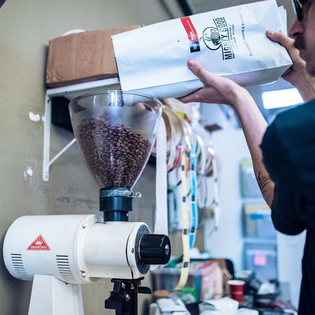 Grinding coffee at the roastery (Copy)