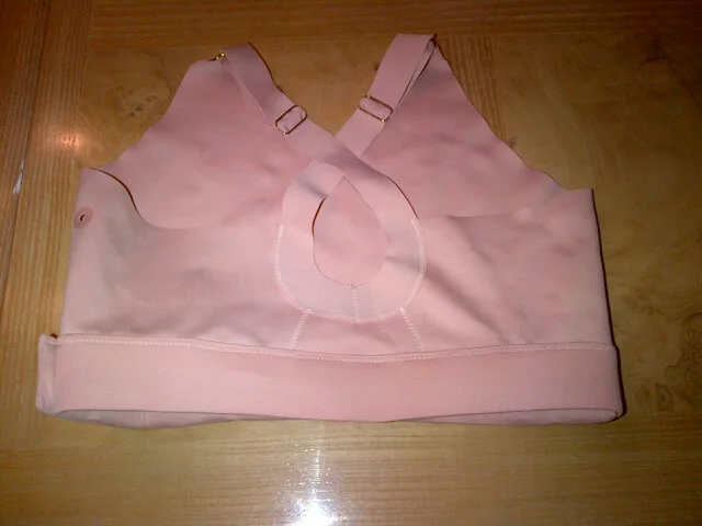 We got close to the final design with the first prototype and realized where the proper closure should be located. Many thanks to my fit models and then to many Survivors who wore and tested the final prototype (The Nina Bra) 10/2013 as seen to the right on the cover of Revenge Fashion Magazine.
