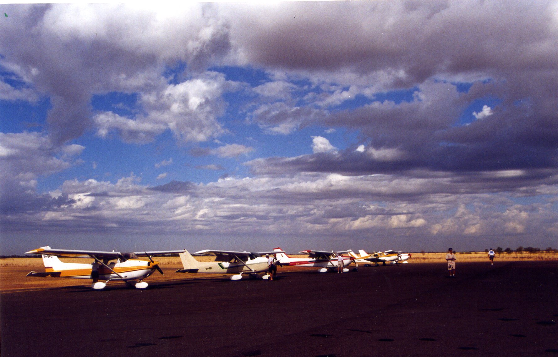 Parked planes with sky.jpg
