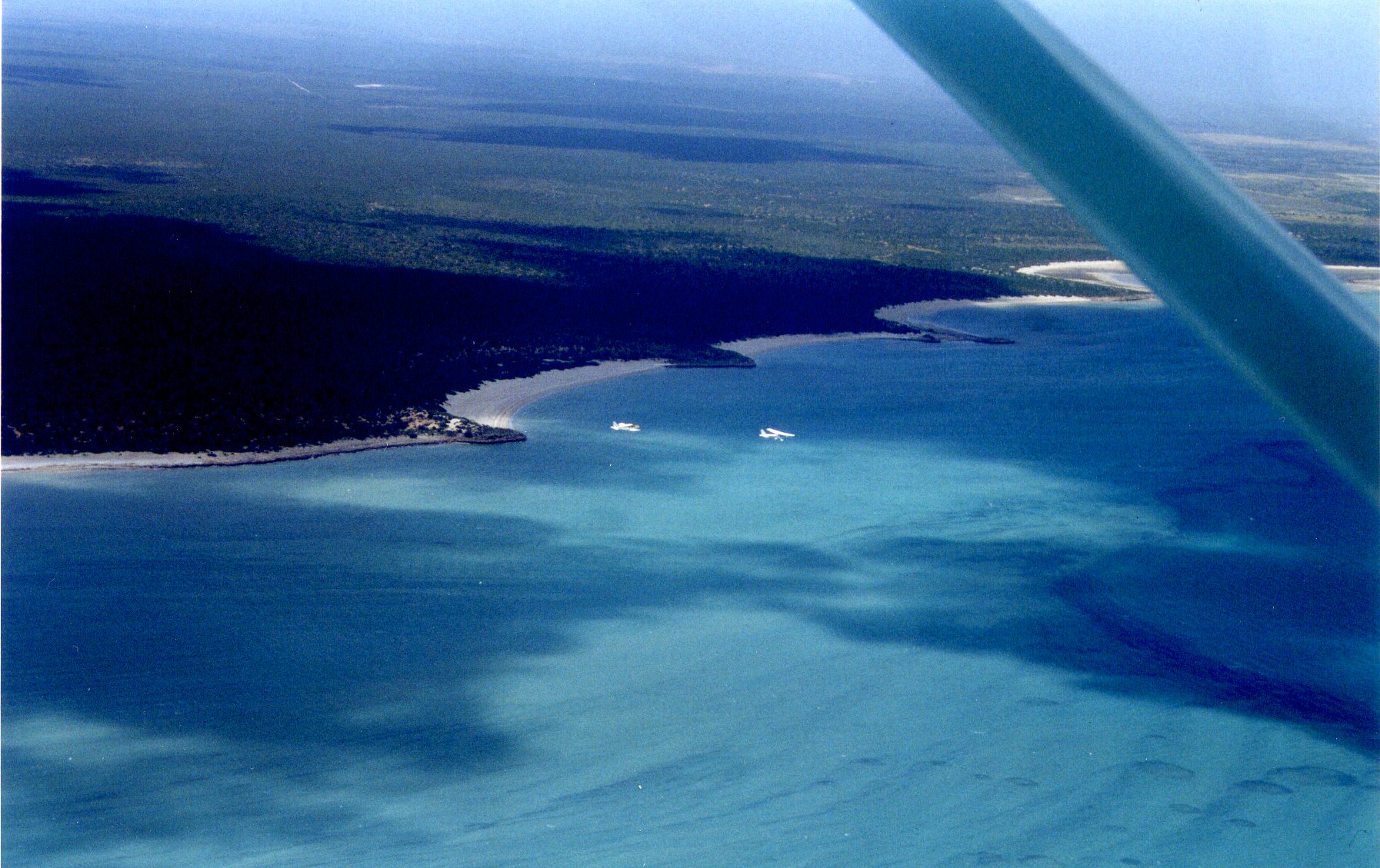 2 planes over the ocean.jpg