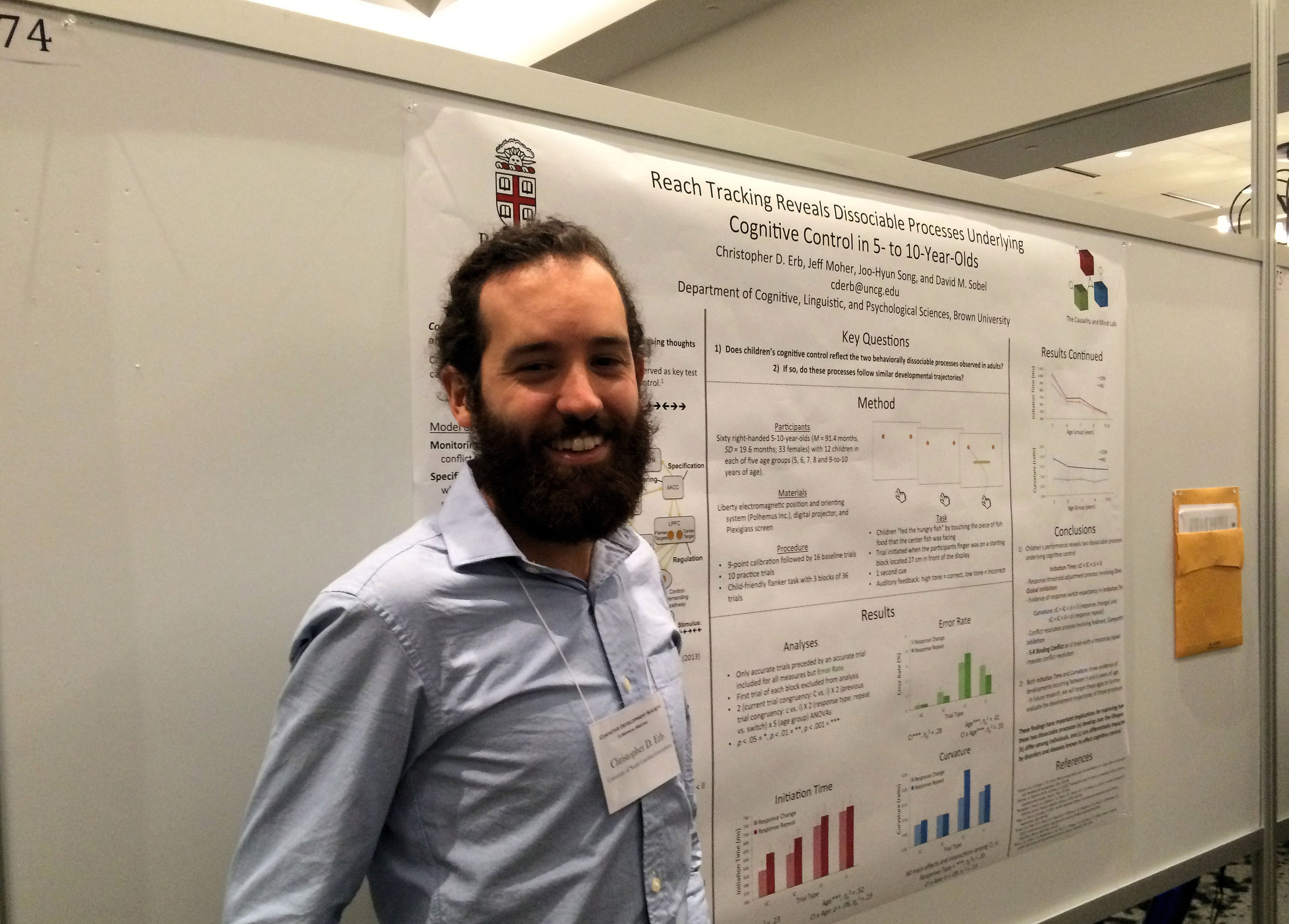 Postdoctoral fellow Chris Erb presents on using a "reach tracking" procedure that enables us to understand how children's thinking is linked to their behavior