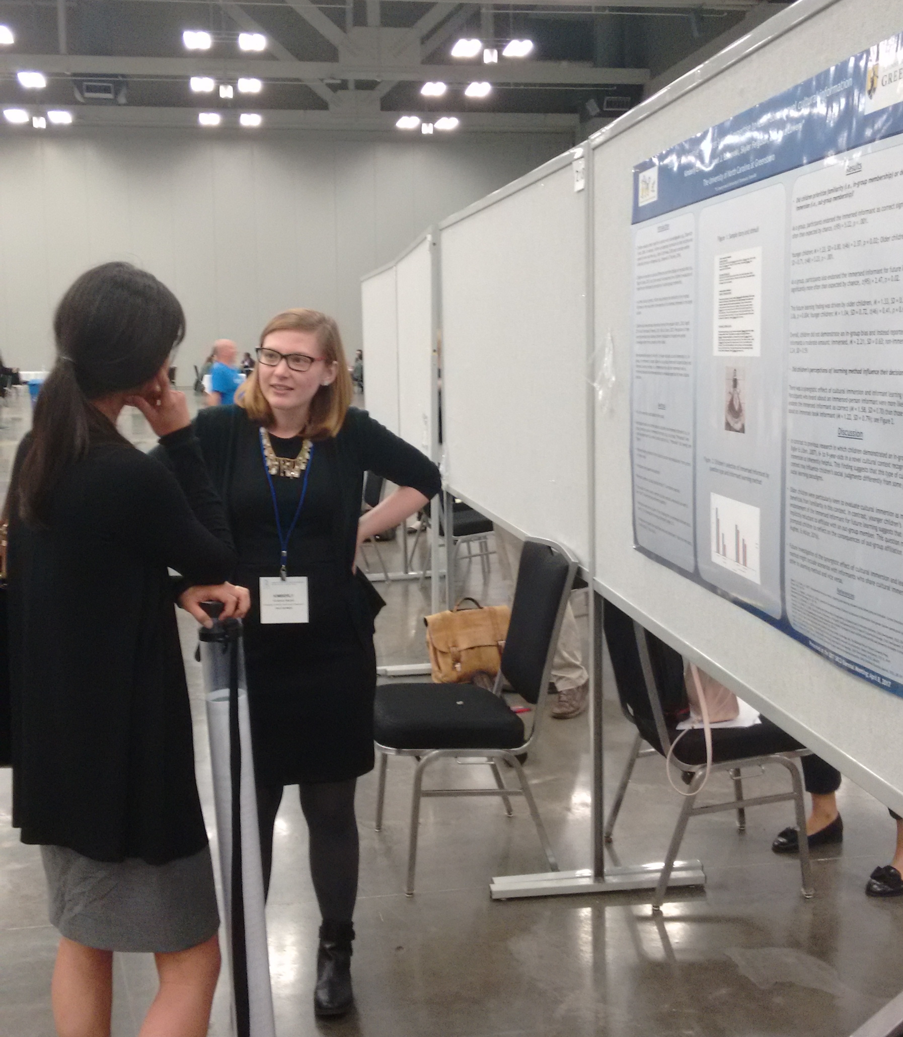  Kimmy Marble talking to an interested colleague about children's use of expertise when learning about unfamilar cultures at SRCD 2017 