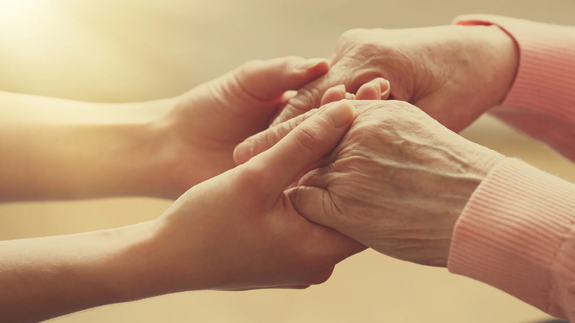 old-young-holding-hands.jpg