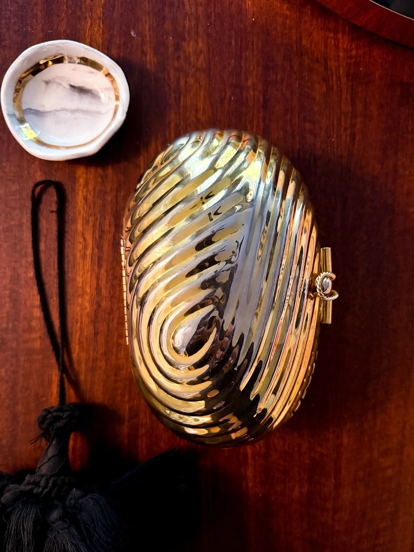 STORIES SALE coming next Tuesday 10/28. 
Vintage pieces we haven&rsquo;t listed online&mdash;for a limited time. Tap the countdown in our stories to be notified when it&rsquo;s time. 
L to R:
Vintage gold-toned swirl minaudi&egrave;re 
Hand-carved wo