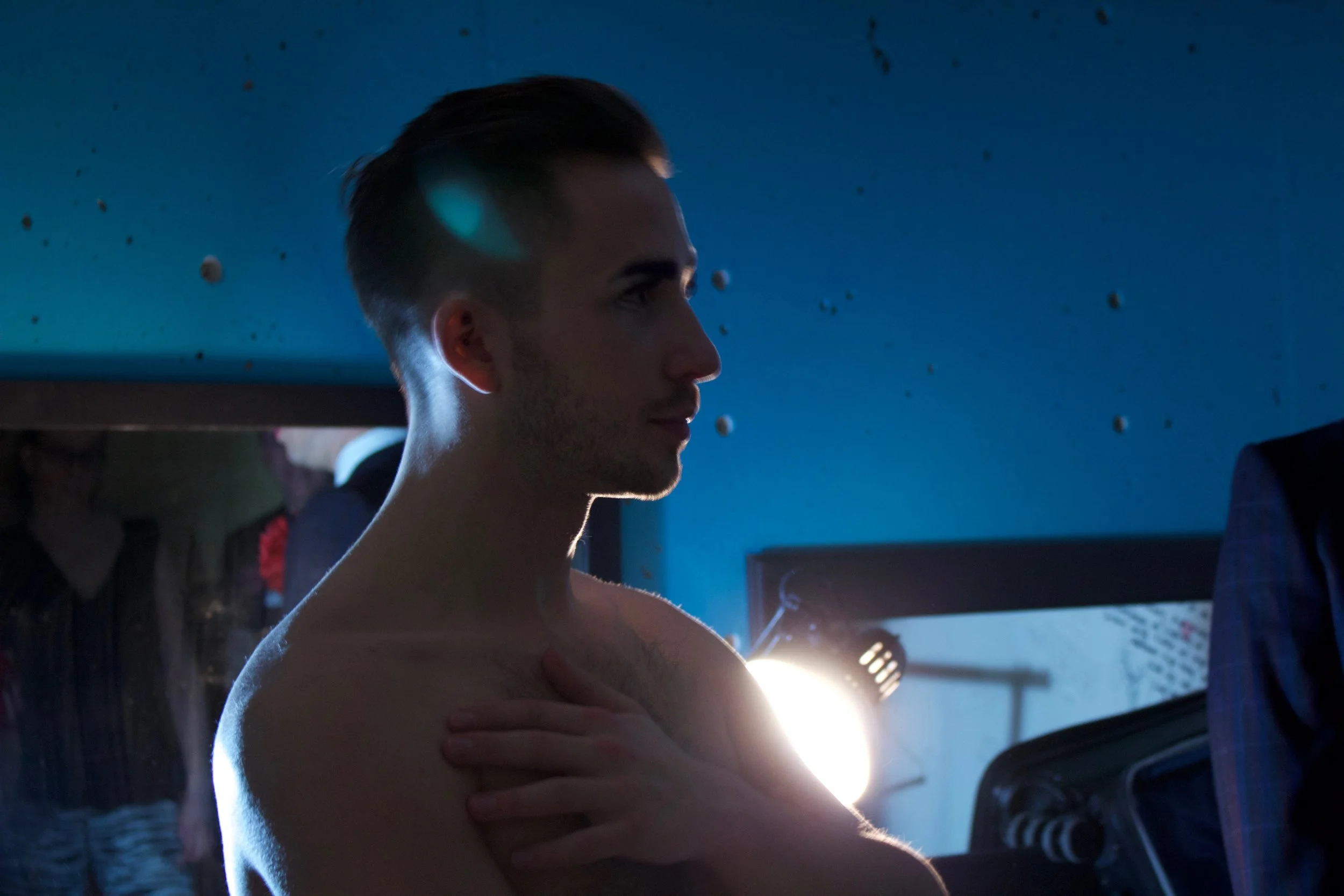 MAN UP! choreographer, Joshua Wolchansky, prepares to go onstage for SPICE BOYS.