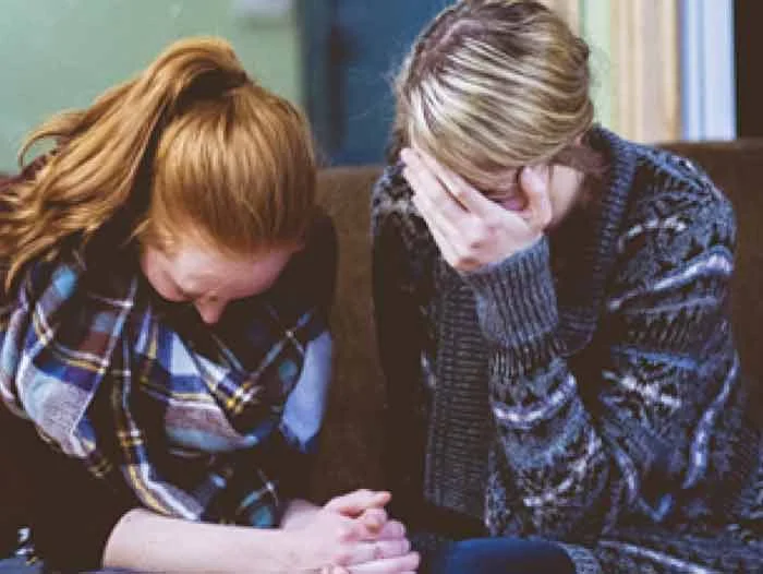 women-praying-together.jpg
