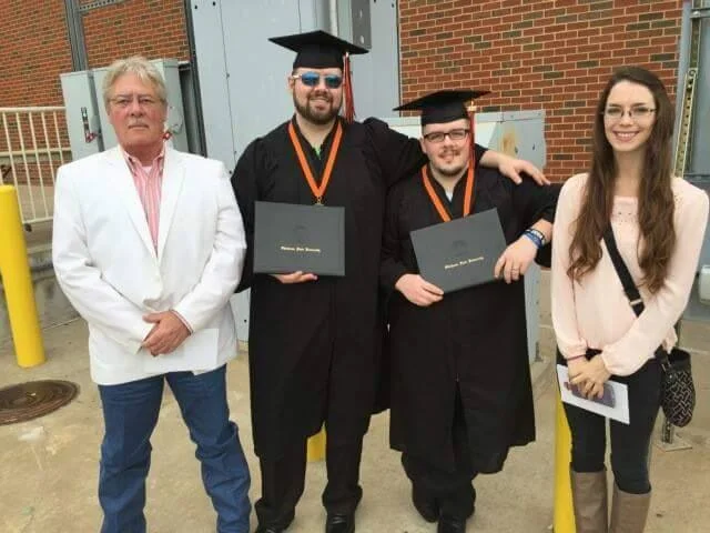 Chad (second from right) graduating from Oklahoma State University May 2015