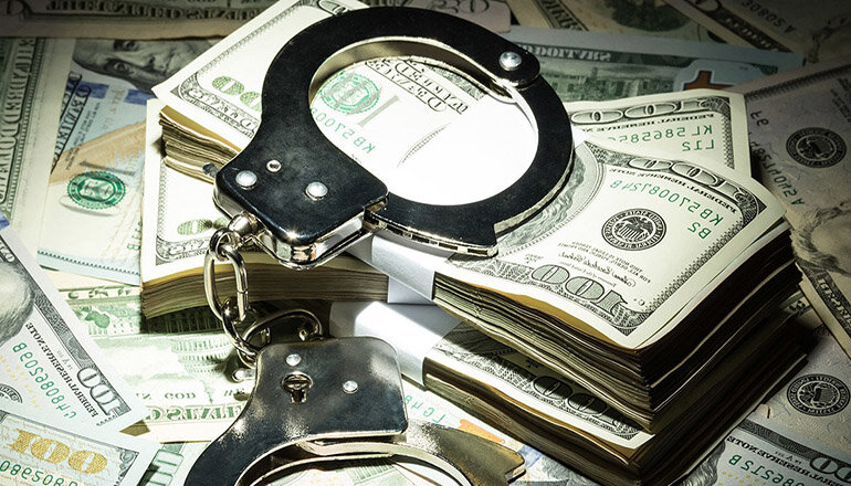 money handcuffs.jpeg