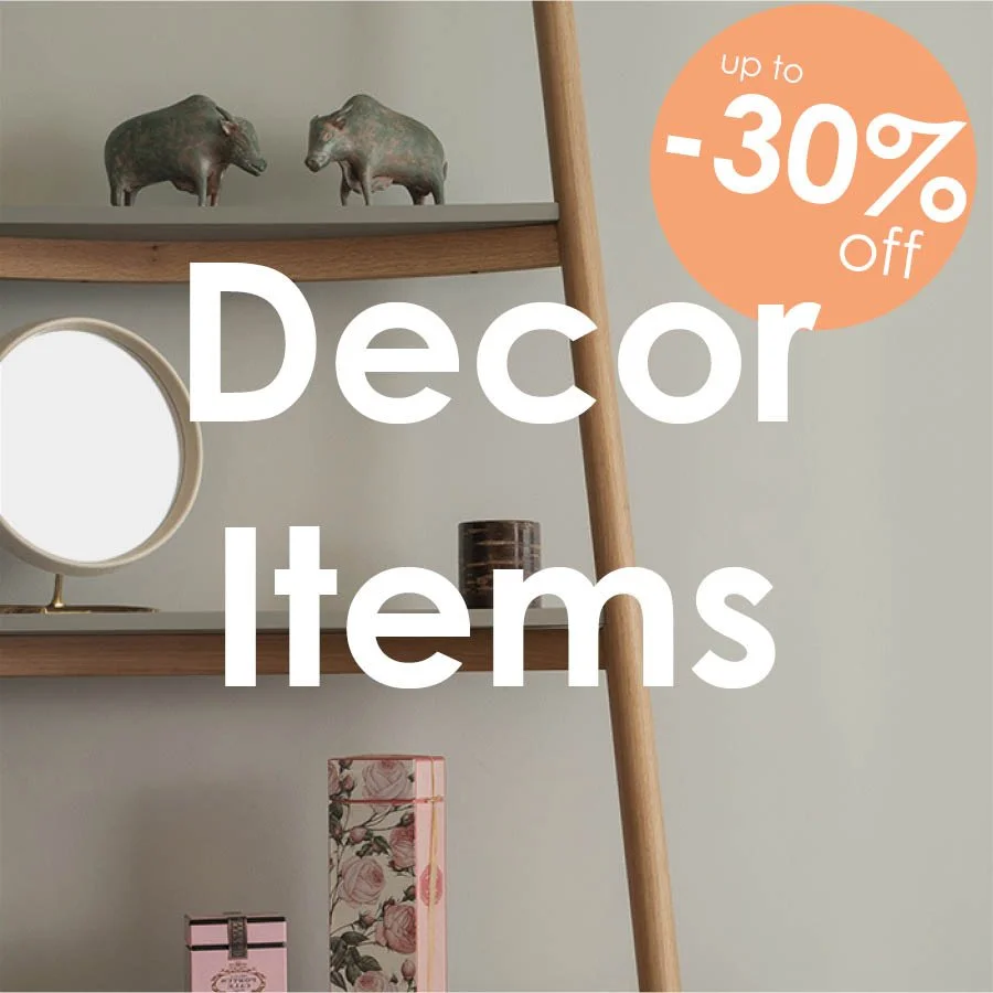 Wooden ladder shelf styled with miniature sculptures, a round mirror, and decorative accents during a 30% off decor sale