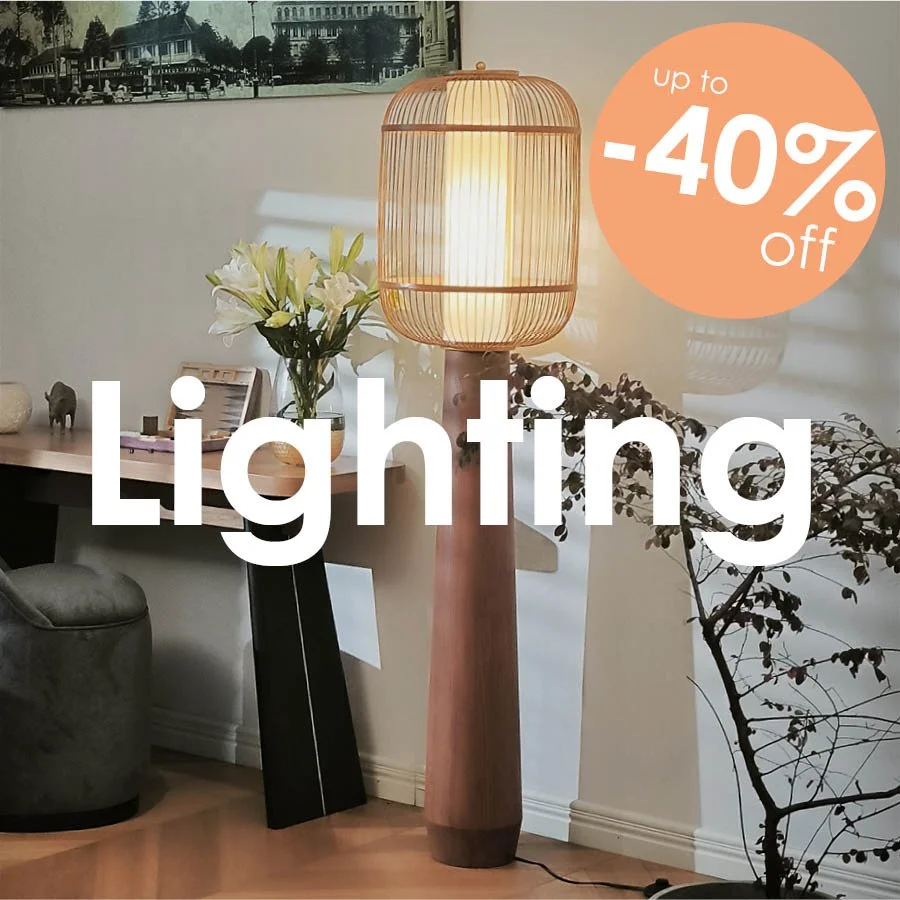 Modern wooden floor lamp with a slatted lantern shade in a living room promotion offering up to 40% off lighting.