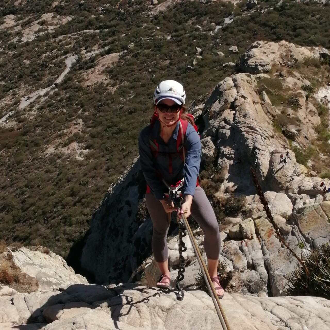 Climbing a big wall.