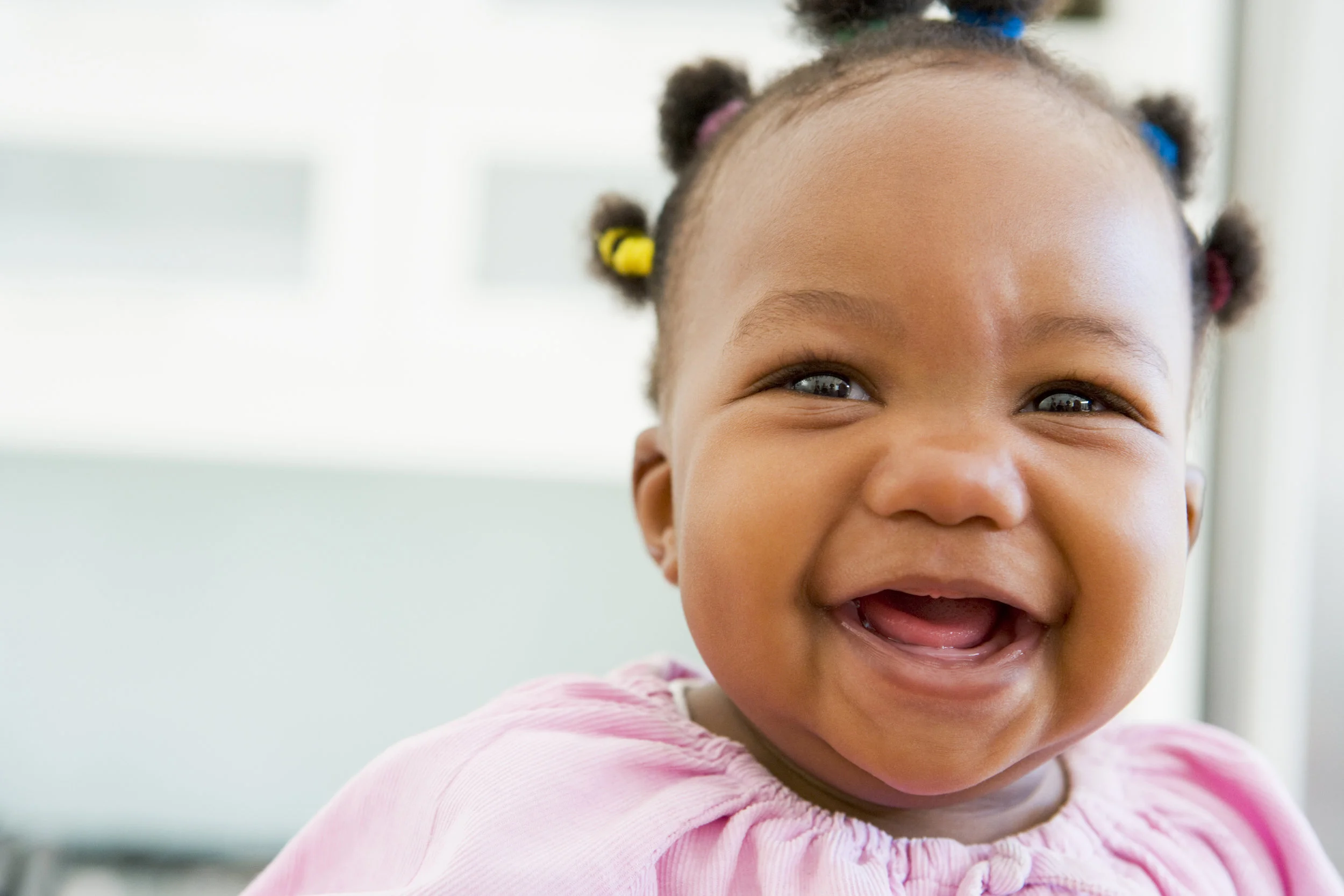 bigstock-Baby-Indoors-Laughing-4136666.jpg