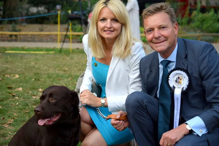 Craig with his wife, Kati Mackinlay, and their Chocolate Labrador, Libby