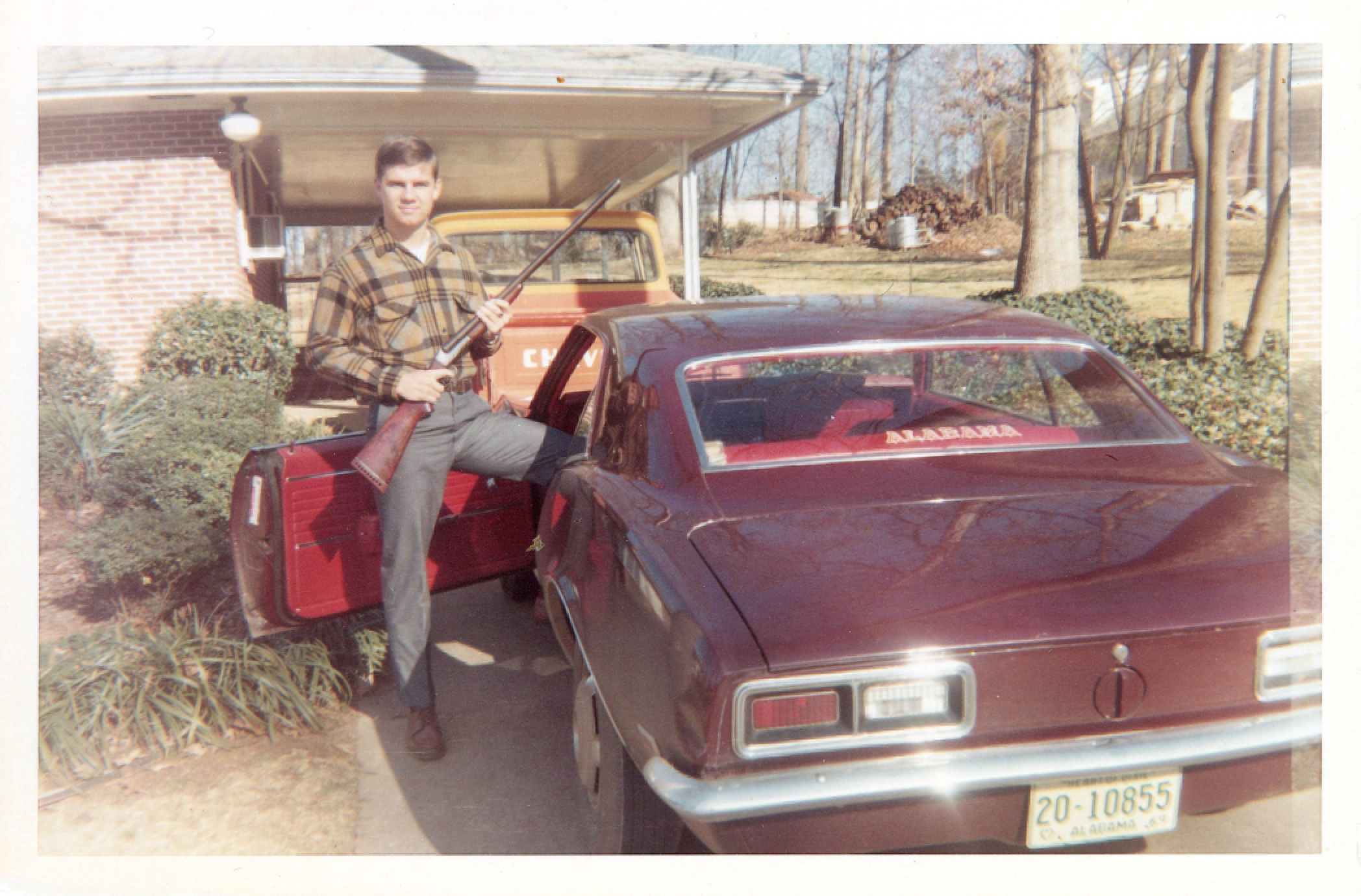 Before dad was a preacher, he had guns! And cool cars! And red vinyl interiors! And amazing shirts that I would totally wear now. #rolltide (c. 1974 maybe?)