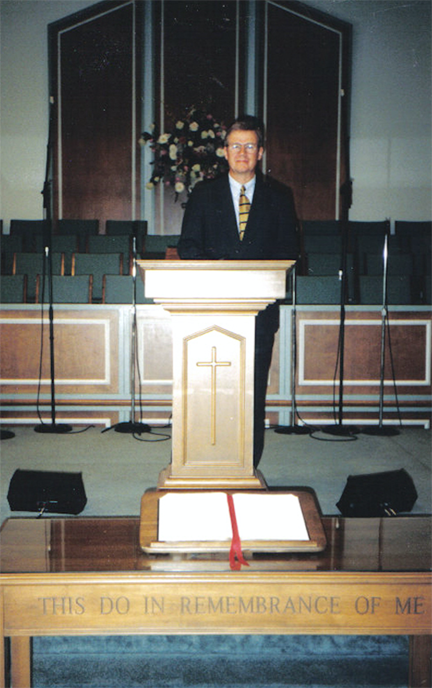 This is dad in the pulpit at Woodmont. No idea what he was posing for here...