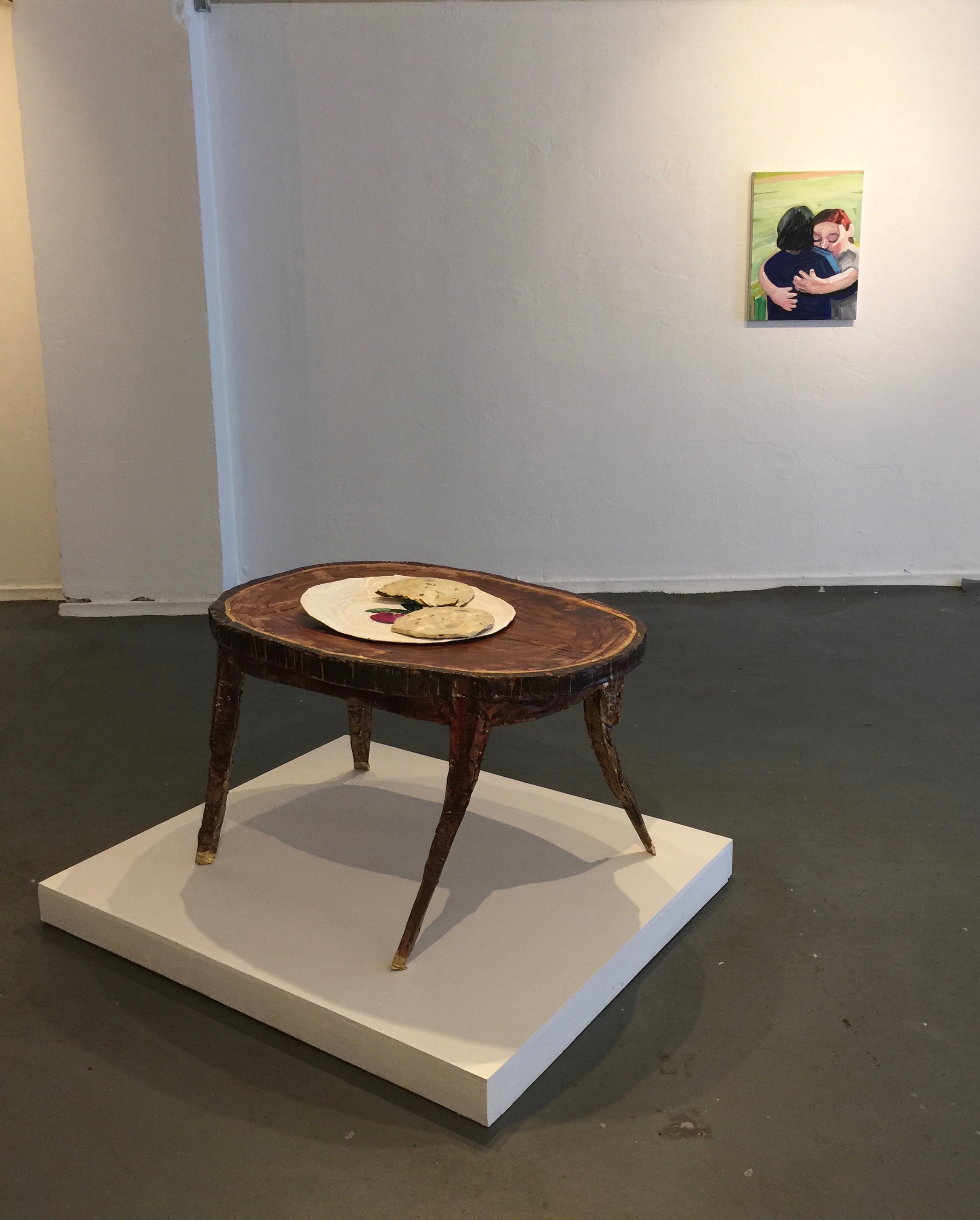 Installation image with Coffee Table with Cookies (2017), Acrylic on cardboard and masking tape on wood pedestal