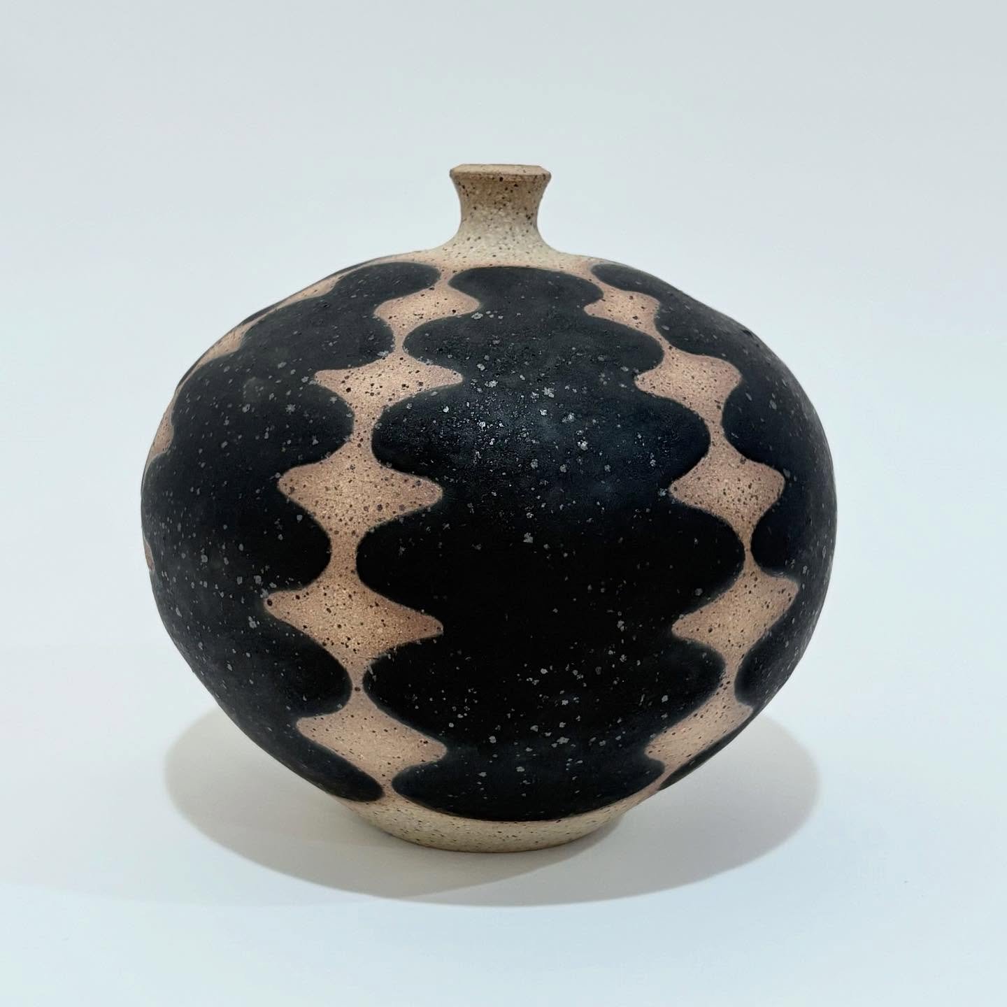 Mini bottle with squiggle pattern, 2025.