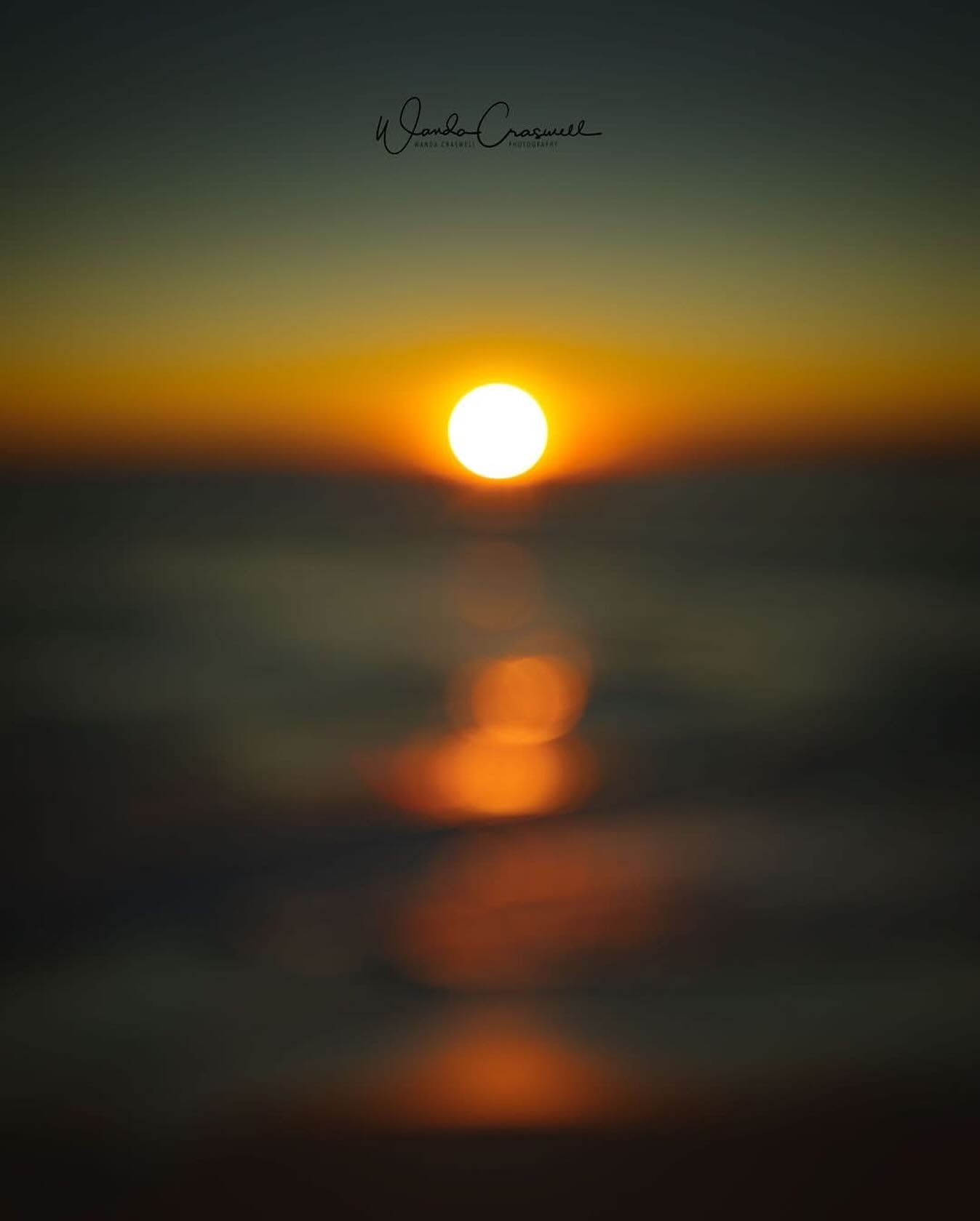 It was almost zero degrees Celsius and I&rsquo;m normally standing barefoot on rocks when I shoot sunrise regardless of temps, but on this morning, I was on sand. The sand was like ice cubes and I could not feel my feet at all after a few minutes. So