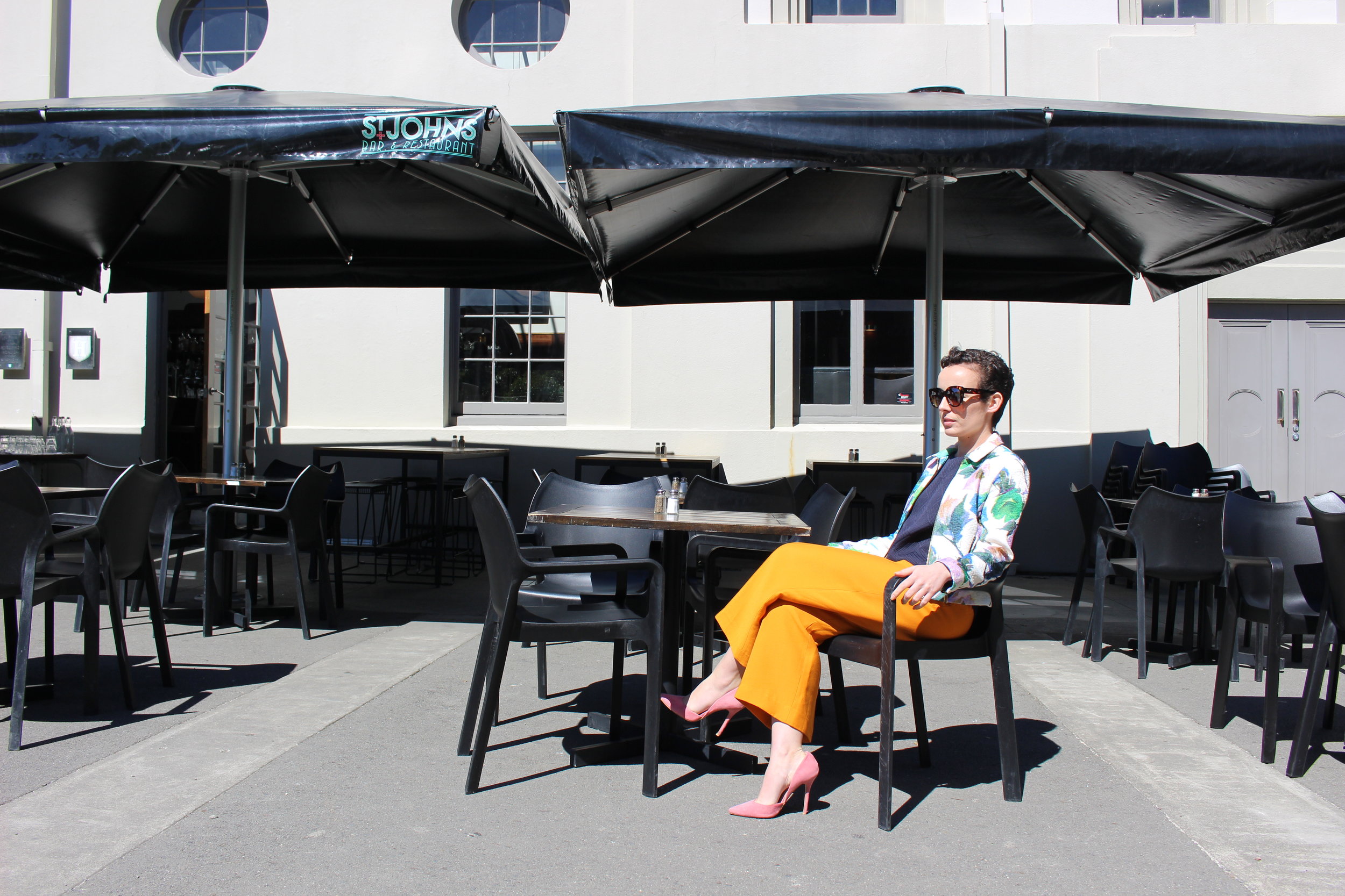 Waiting in vain for a cocktail half as colourful as my outfit