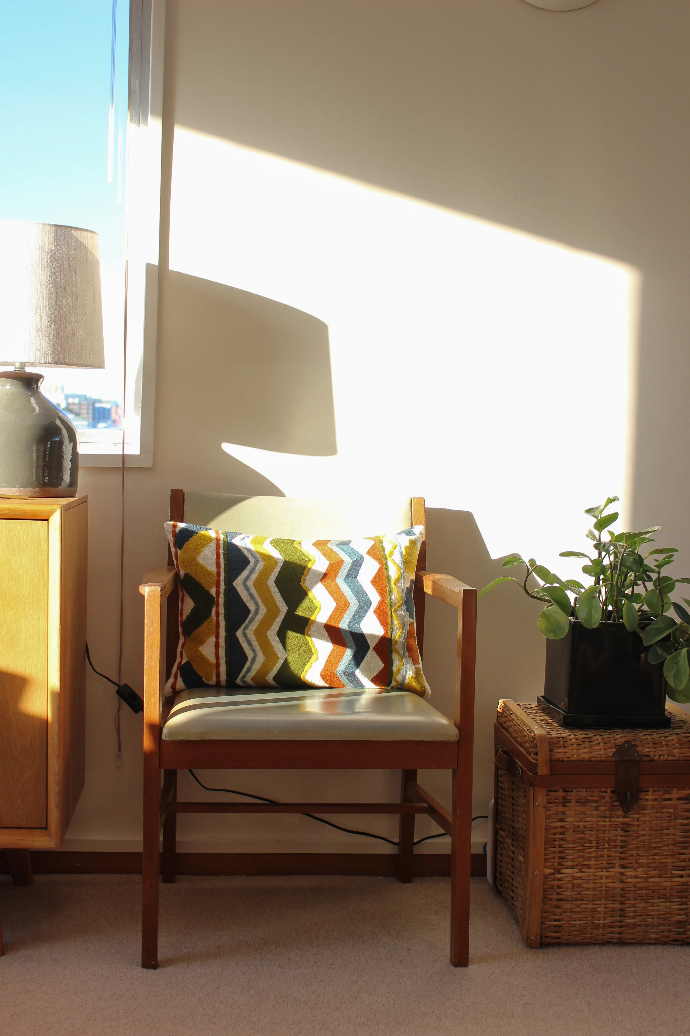 A chair from Hong Kong via way of the op shop and just one of my house plants. I love this cushion, which I picked up at Inhabit Design Store for a redactable price (but well worth it for overall impact!)