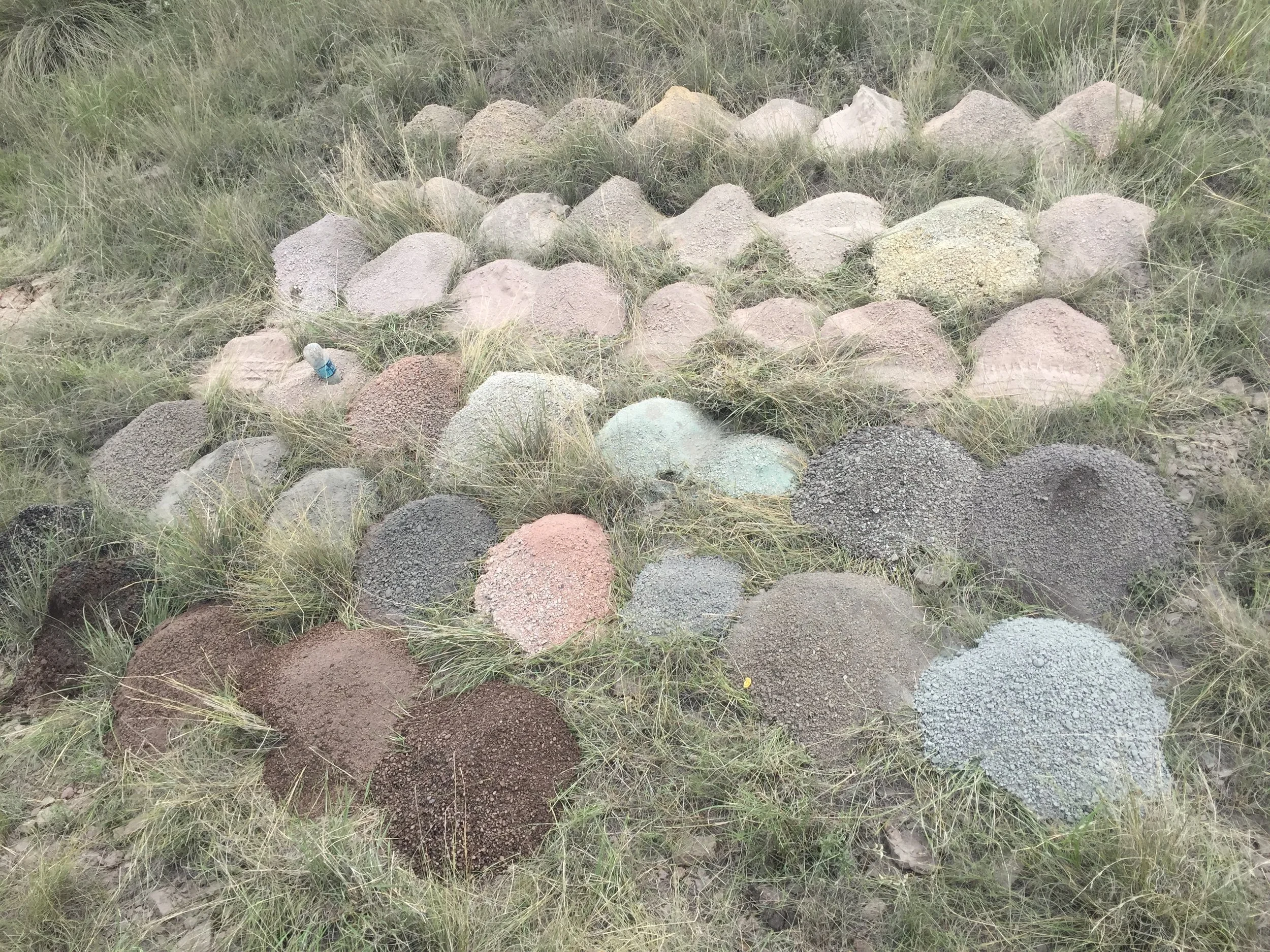 This colorful work of art represents the 600 feet of rock directly below where the vineyard will be planted. A sample of rock cuttings is taken at 25 foot intervals as the drill penetrates deeper into the earth.