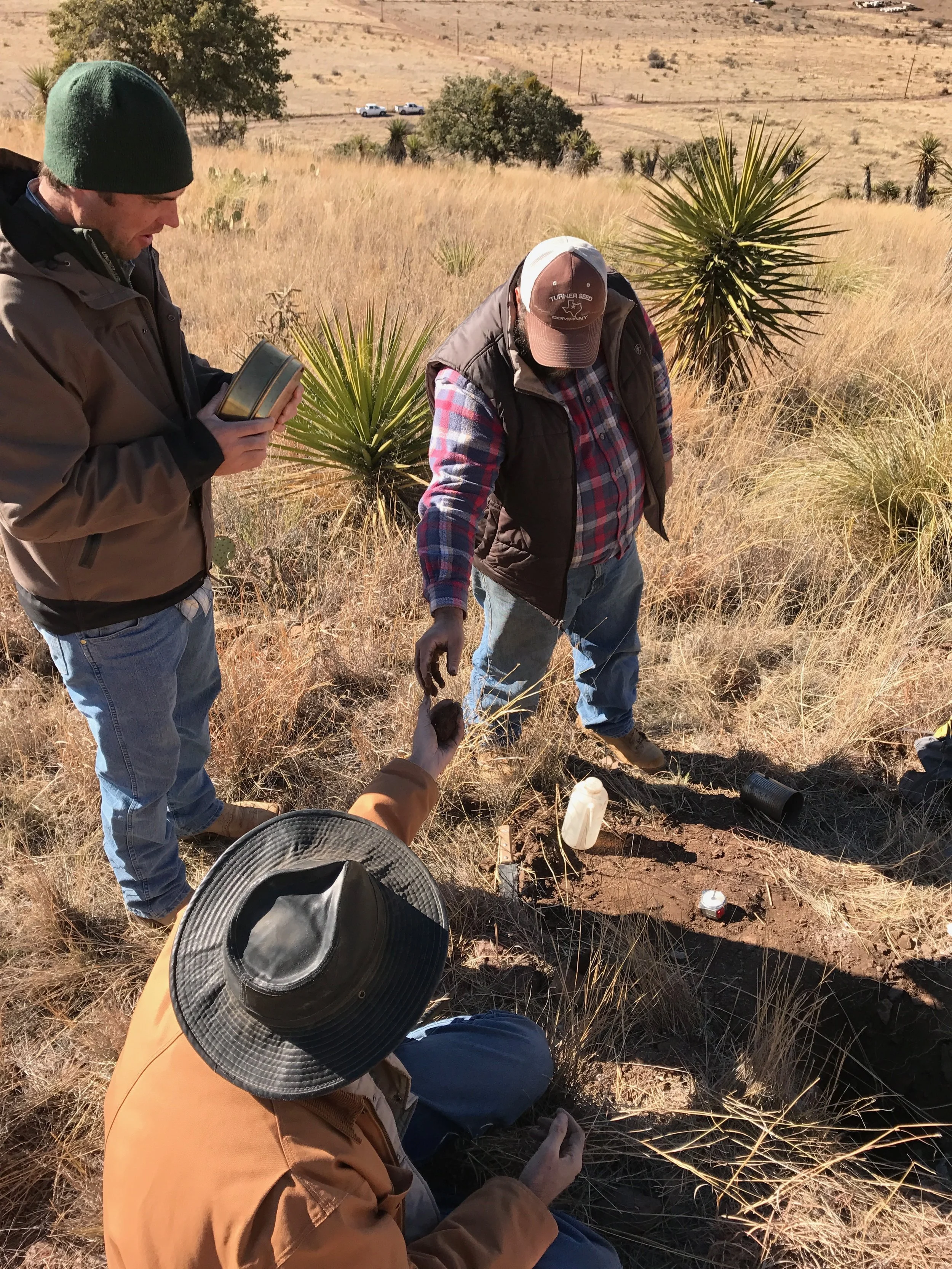 David Jalali, Will Juett and Lynn Loomis, soil scientists from the NRCS in Marfa, describing the soil at Alta Marfa.