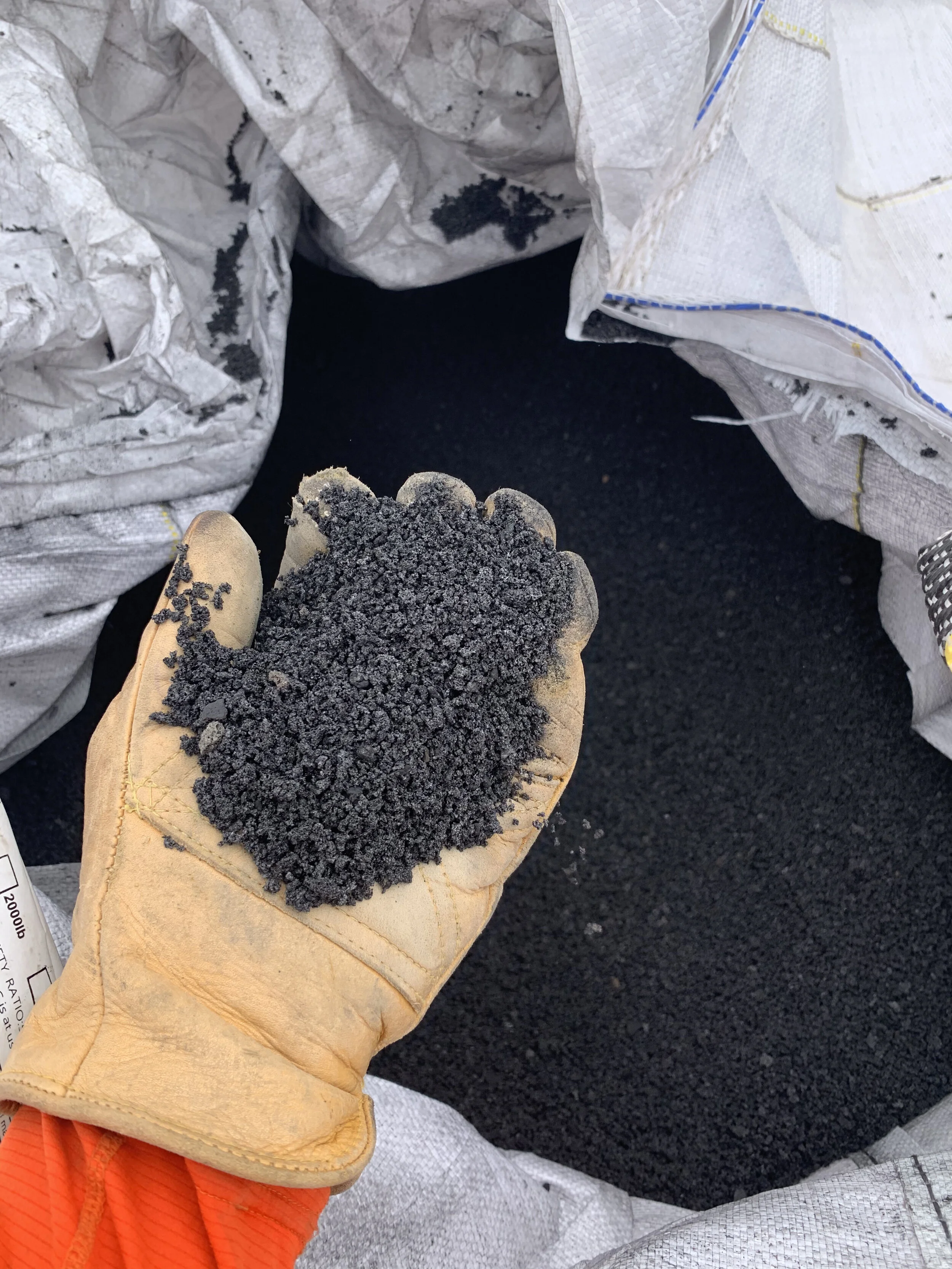 This is biochar. Biochar is burned biomass which can be added to soil for the purpose of adding stable organic matter. We received this biochar as a gift from Trevor. Thanks Trevor!