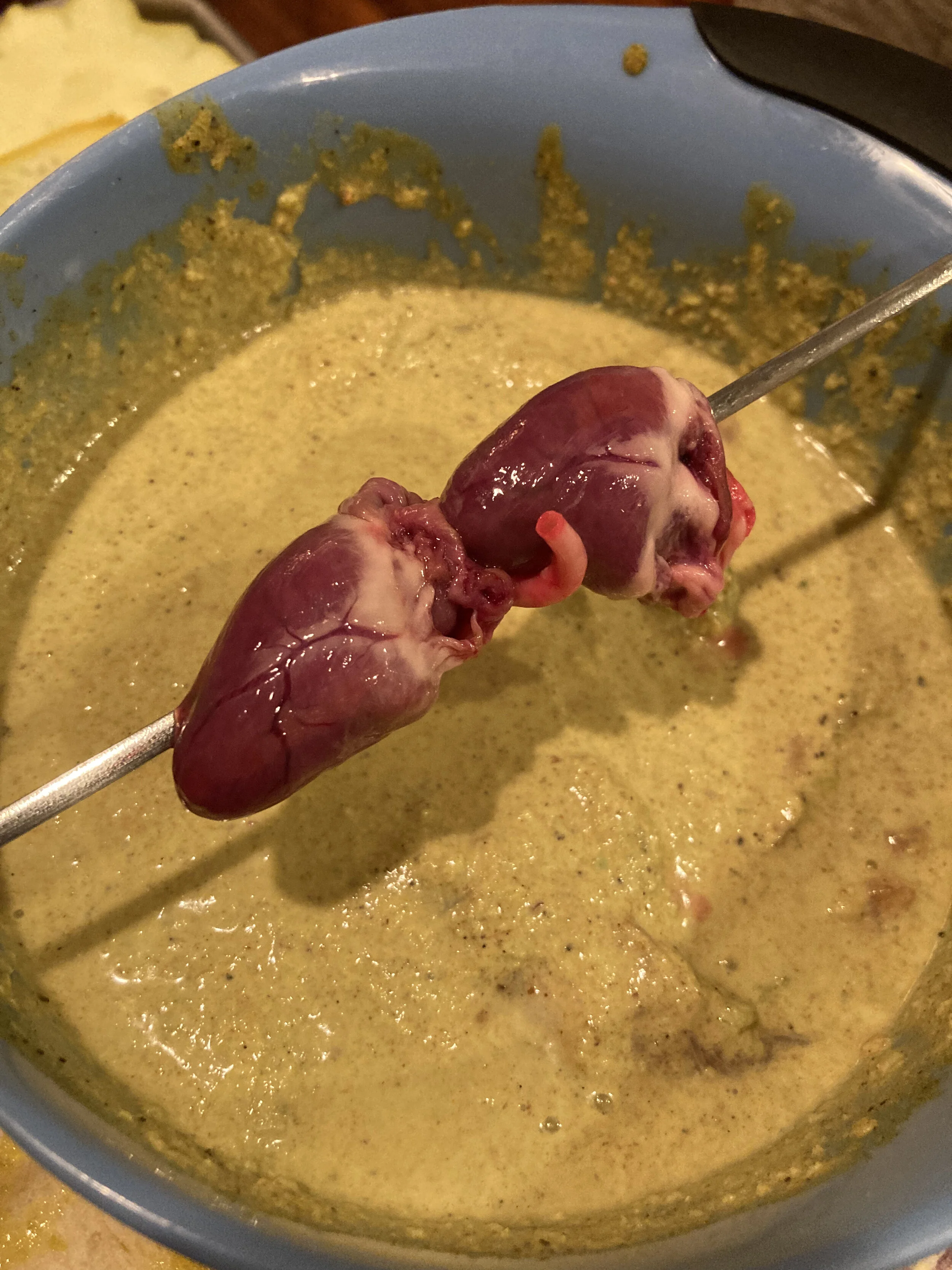 Fresh duck hearts about to be grilled.