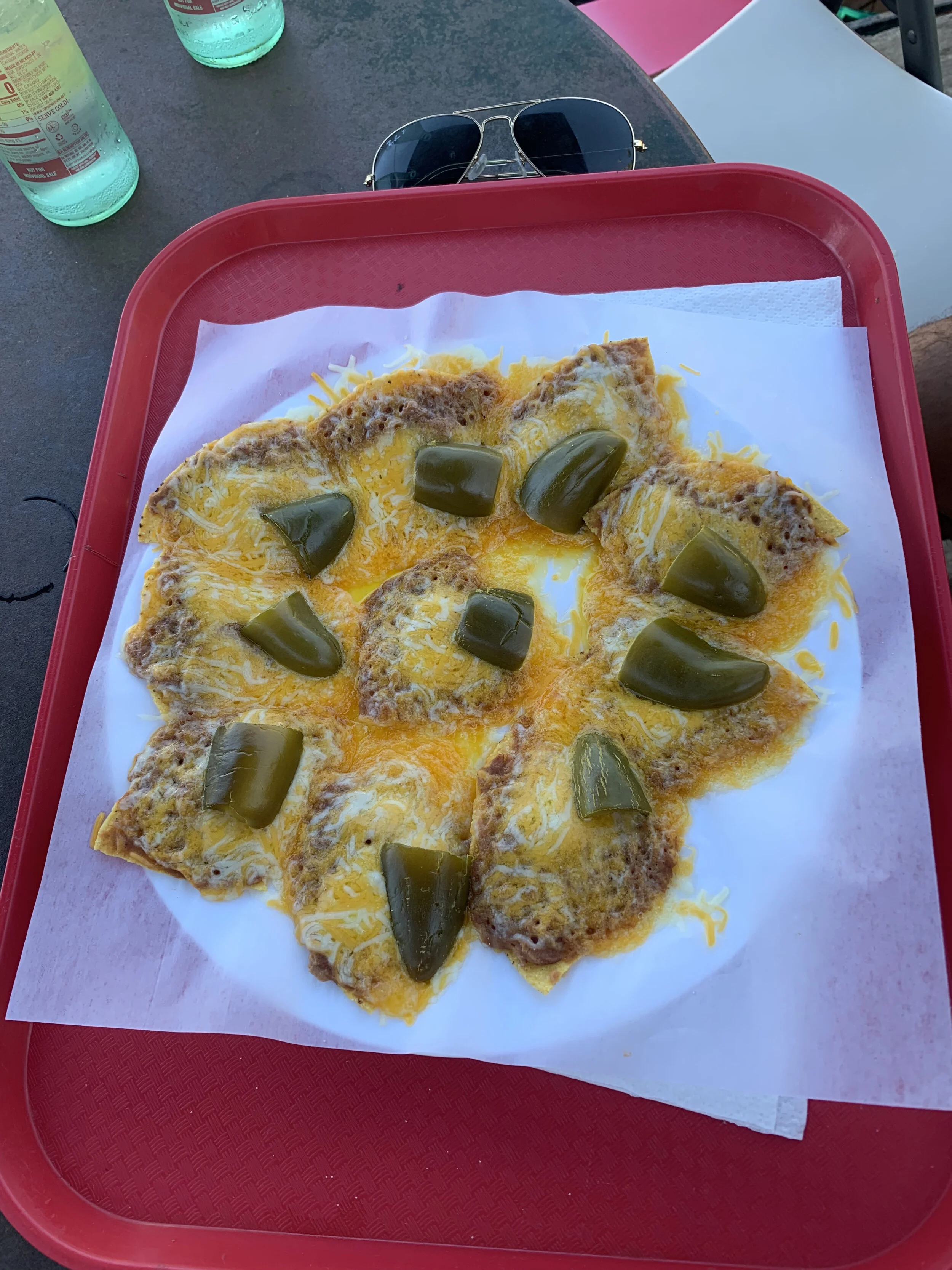 Why aren’t all nachos made this way? Every chip is the perfect bite and there is no pile of crumbled plain chips leftover at the end. I love these. These are from the bar Planet Marfa in Marfa, TX.