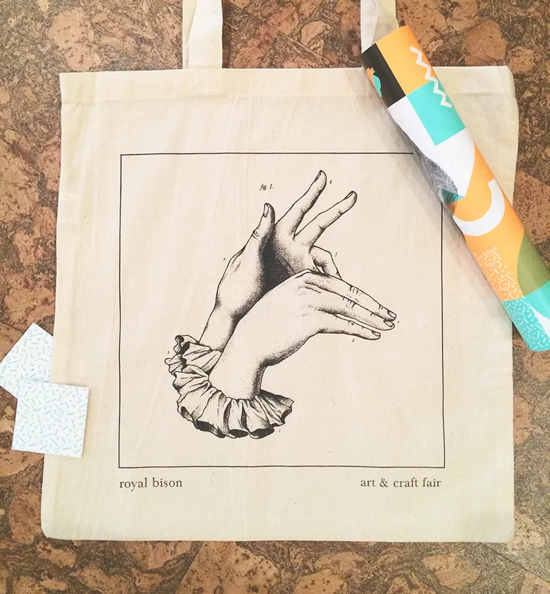 Artist designed tote bags by Erin Greenough.