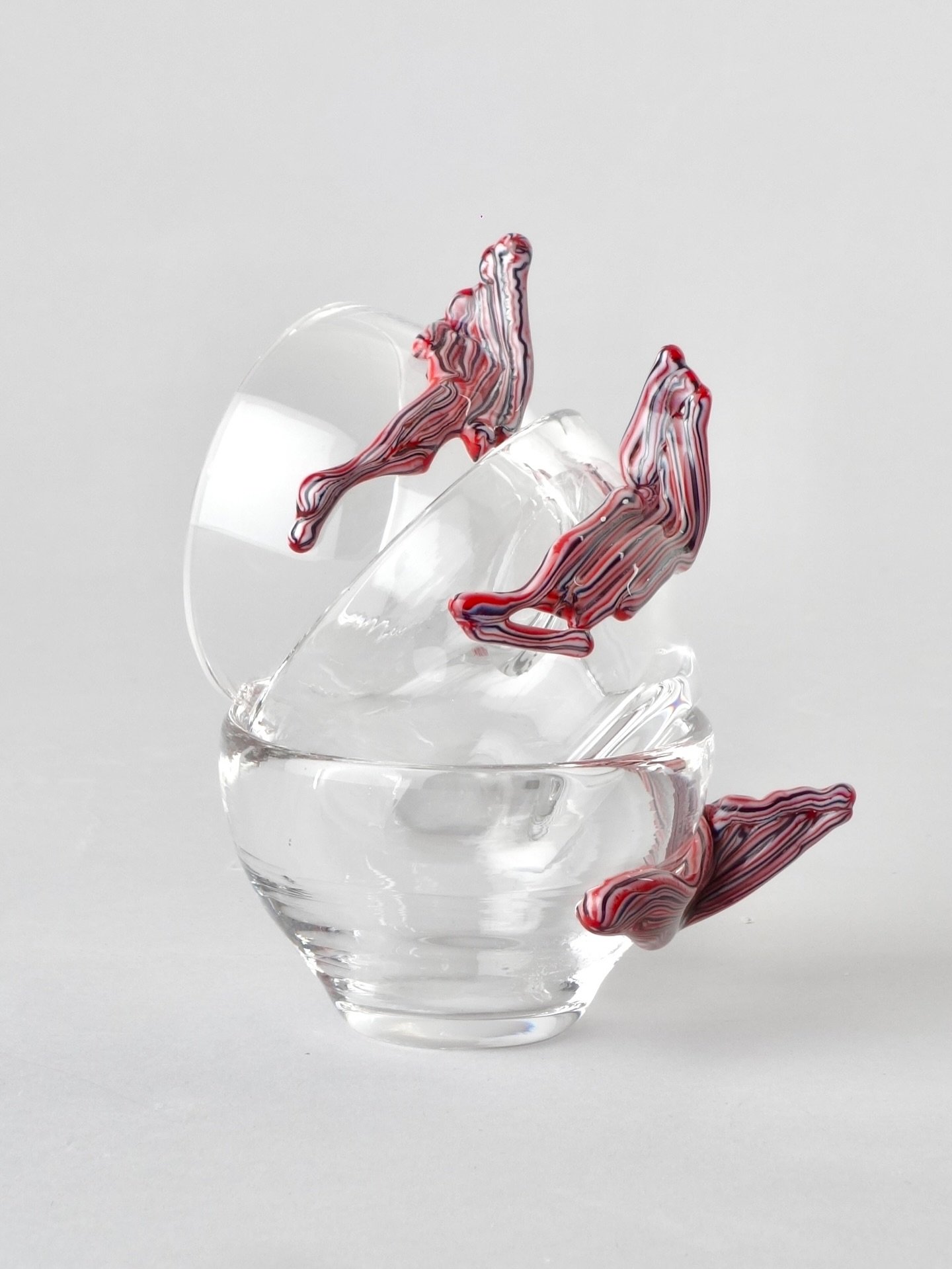 A glimpse into the Liuli collection. 👀✨

Each piece is one of a kind &ndash; born from discarded glass fragments, melted and reshaped into new forms. What was once considered waste becomes poetry in motion.

This project started during a residency i
