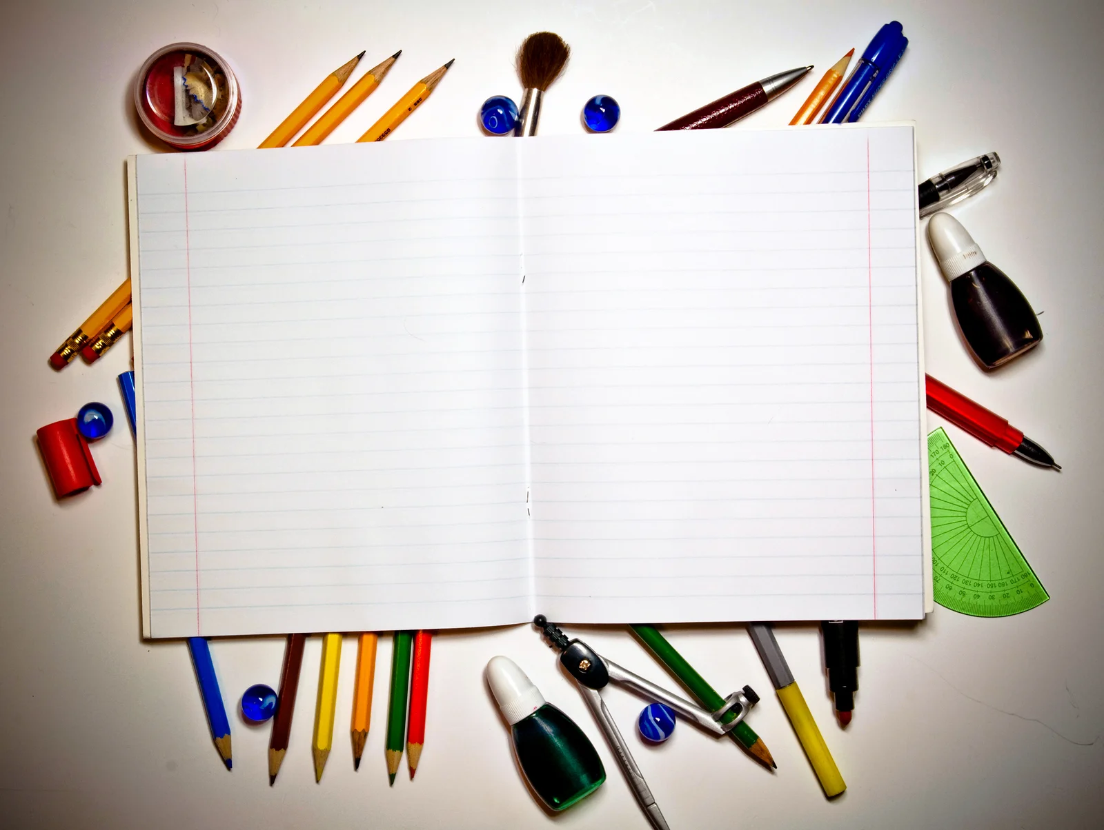 bigstock-Open-writing-book-and-school-t-27243512.jpg