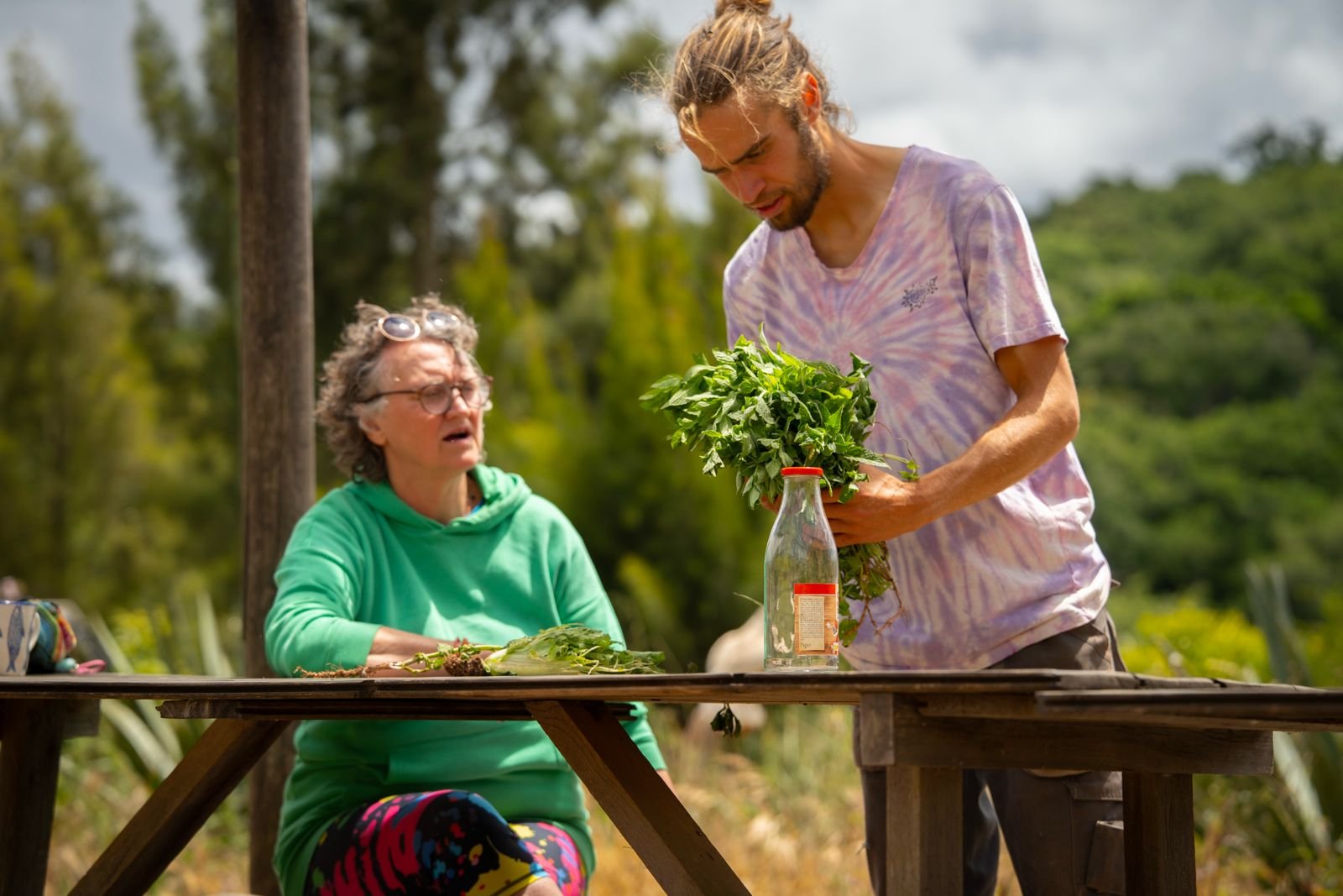 two a quinta residents sorting the veggies from our garden for the lunch