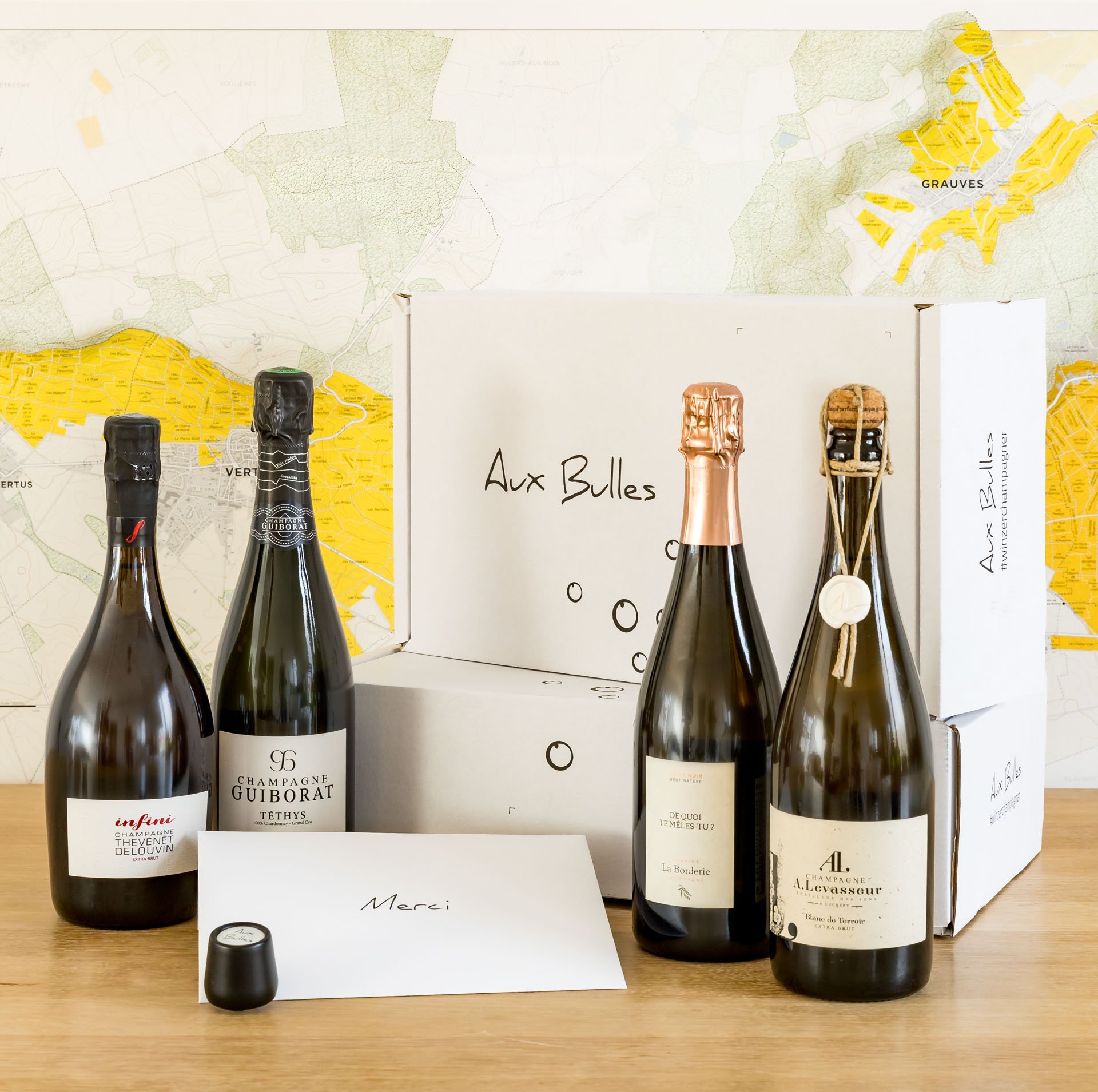 Vier Flaschen Champagner von Champagne Mangin und Champagner Leguillette Romelot, Champagne Mangin und Leguillette Romelot und eine Aux Bulles Champagnerabo von einer Champagnerkarte