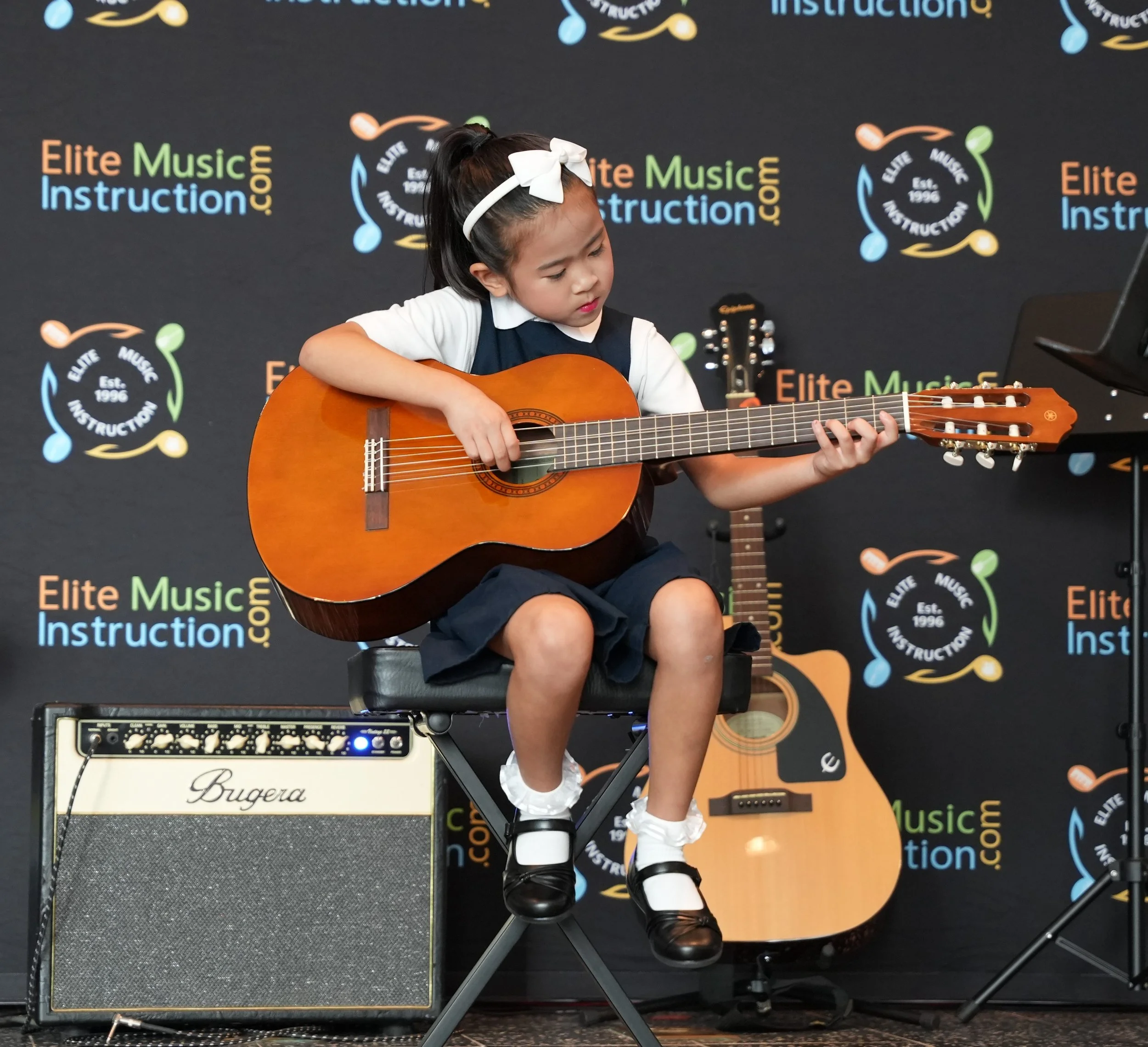 student taking guitar lessons in weston florida