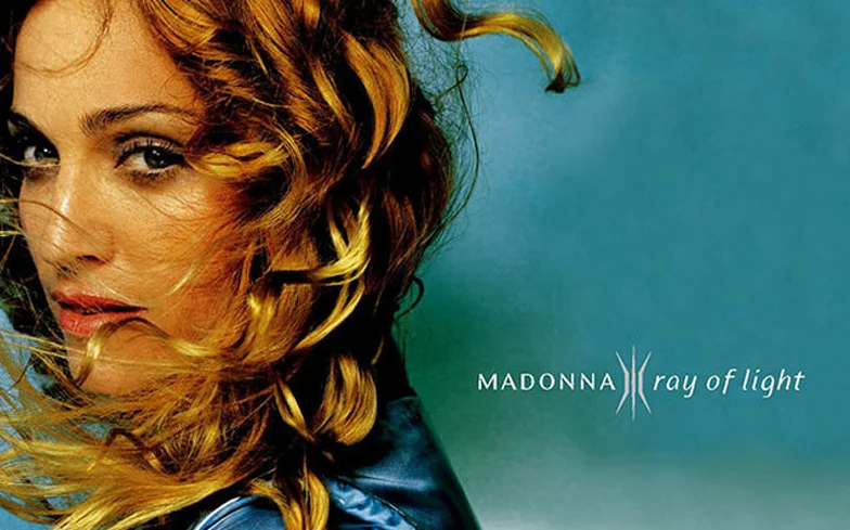 <a href="https://pitchfork.com/reviews/albums/madonna-ray-of-light/" target="_Blank">Pitchfork</a>