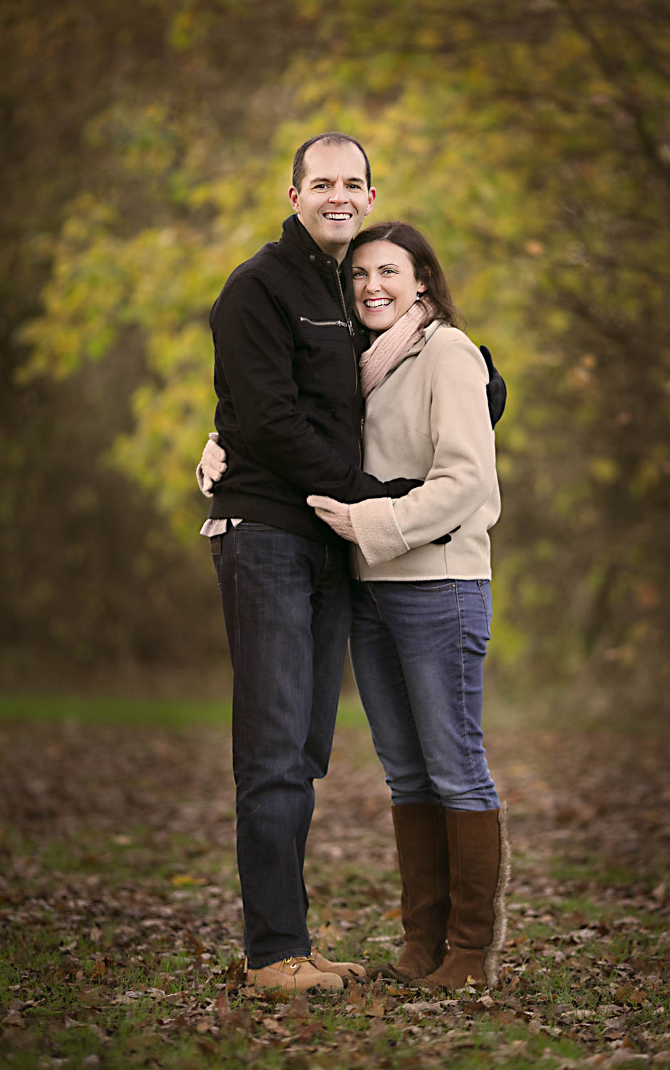  Couple posing during an Autumn family photoshoot in Milton Keynes. 
