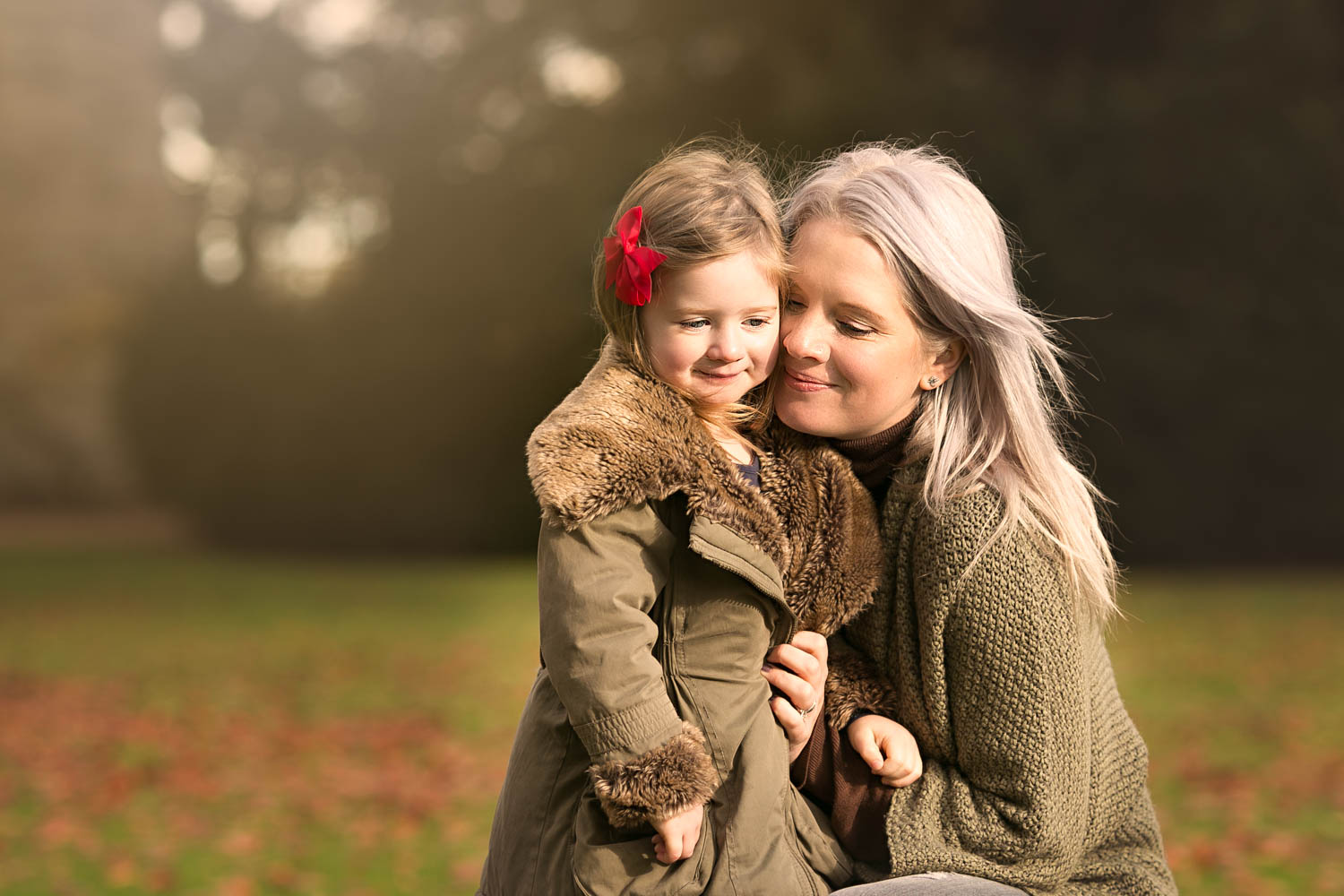  Mother and daughter during family photoshoot   at Castle Ashby in Northampton. 