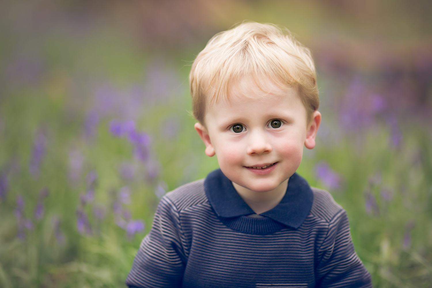   Boy amongst the Bluebells during a Spring Child Photoshoot in Olney, Milton Keynes. 