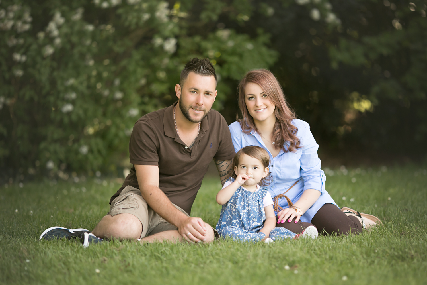  Father, Mother and daughter pose for photos during a Bedford Lifestyle Photography session in Bedford Park. 