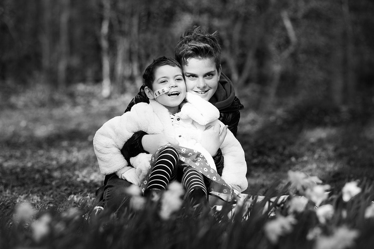 Brother and Sister pose during family photoshoot in Bedford