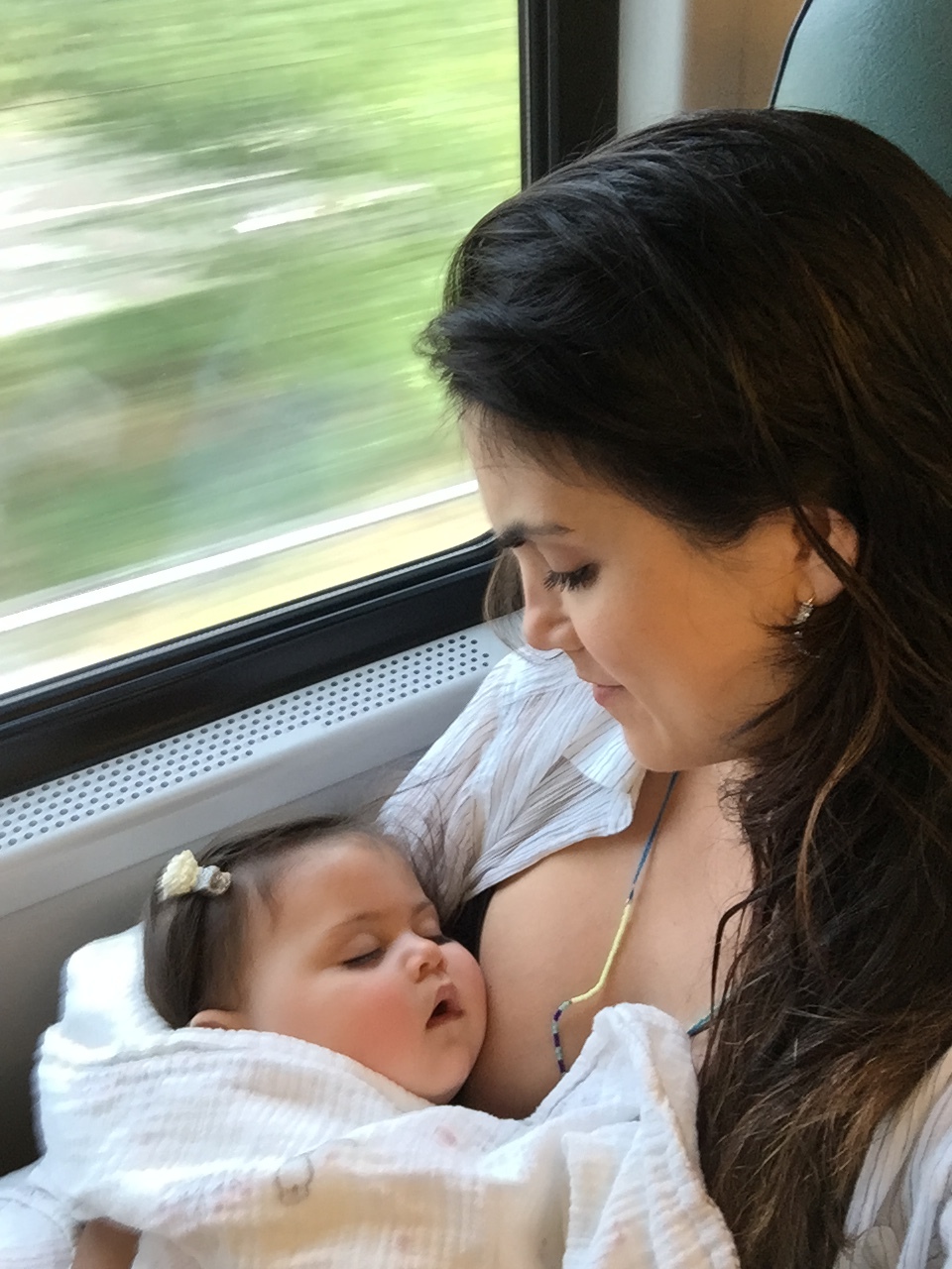 The window seat is best for mom and baby.