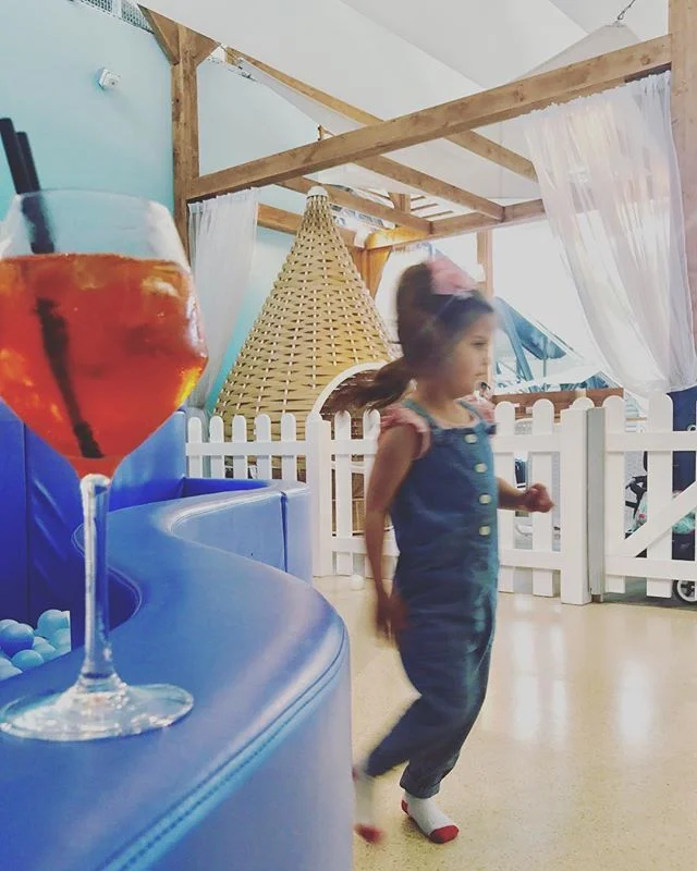 Nice airport has a nice rest area for baby and daddy. It's upstairs at the cafe with the big slide. #niceairport #airporthacks #nicebaby #heyjetsetbaby #aperol