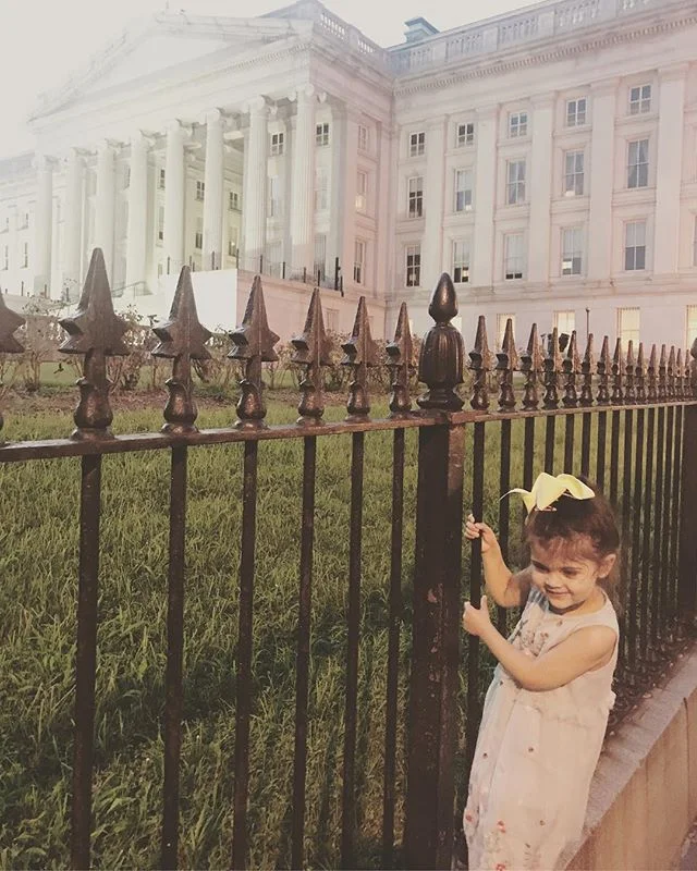 Baby fence jumper!!!! Luckily the secret service let her slide on account of her cuteness. #washingtondcbaby #treasury #showmethemoney #heyjetsetbaby